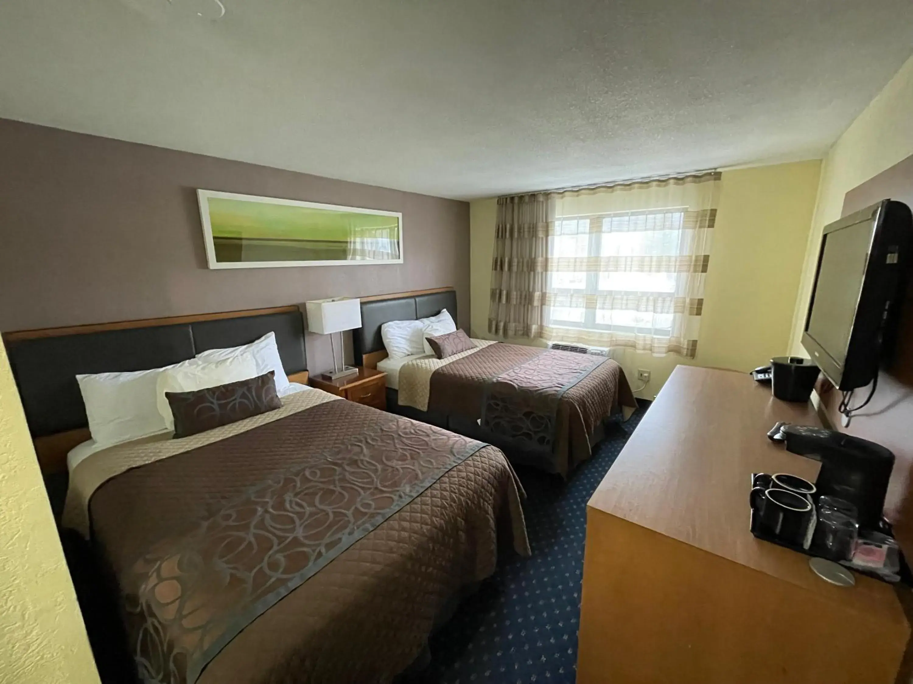 Bed in Lakeside Inn Bed in Lakeside Inn