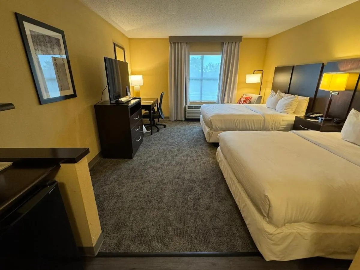 Bed in Comfort Inn & Suites Lexington Park near Pax River