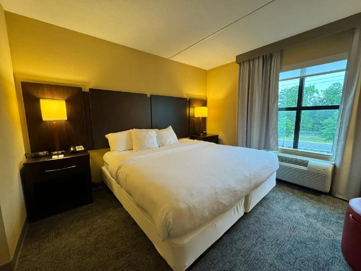 Bed in Comfort Inn & Suites Lexington Park near Pax River
