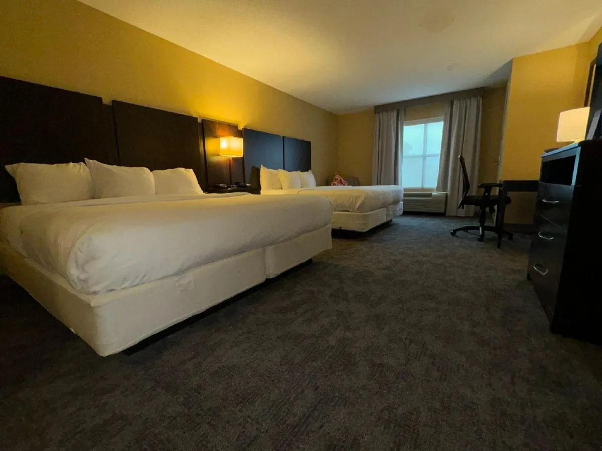 Bed in Comfort Inn & Suites Lexington Park near Pax River