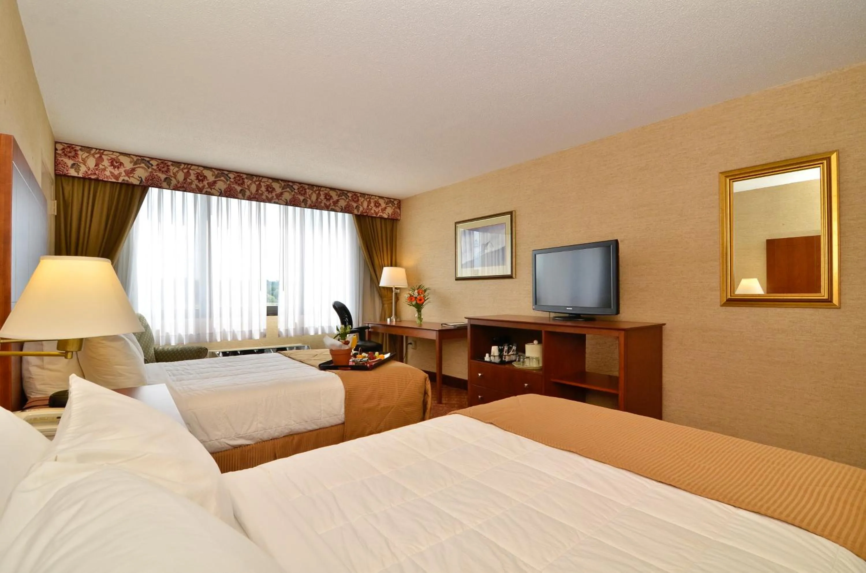 Bed in Clarion Hotel Portland Airport ME