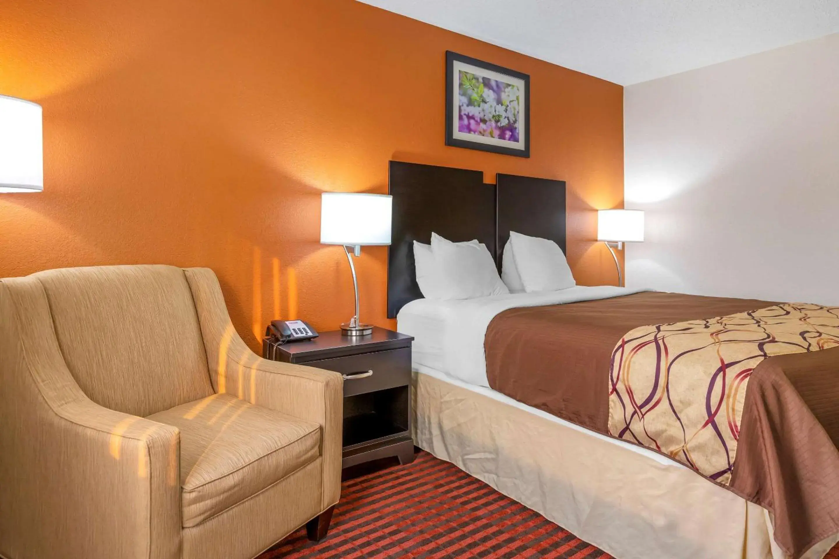 Photo of the whole room, Bed in Rodeway Inn Coopersville Photo of the whole room, Bed in Rodeway Inn Coopersville