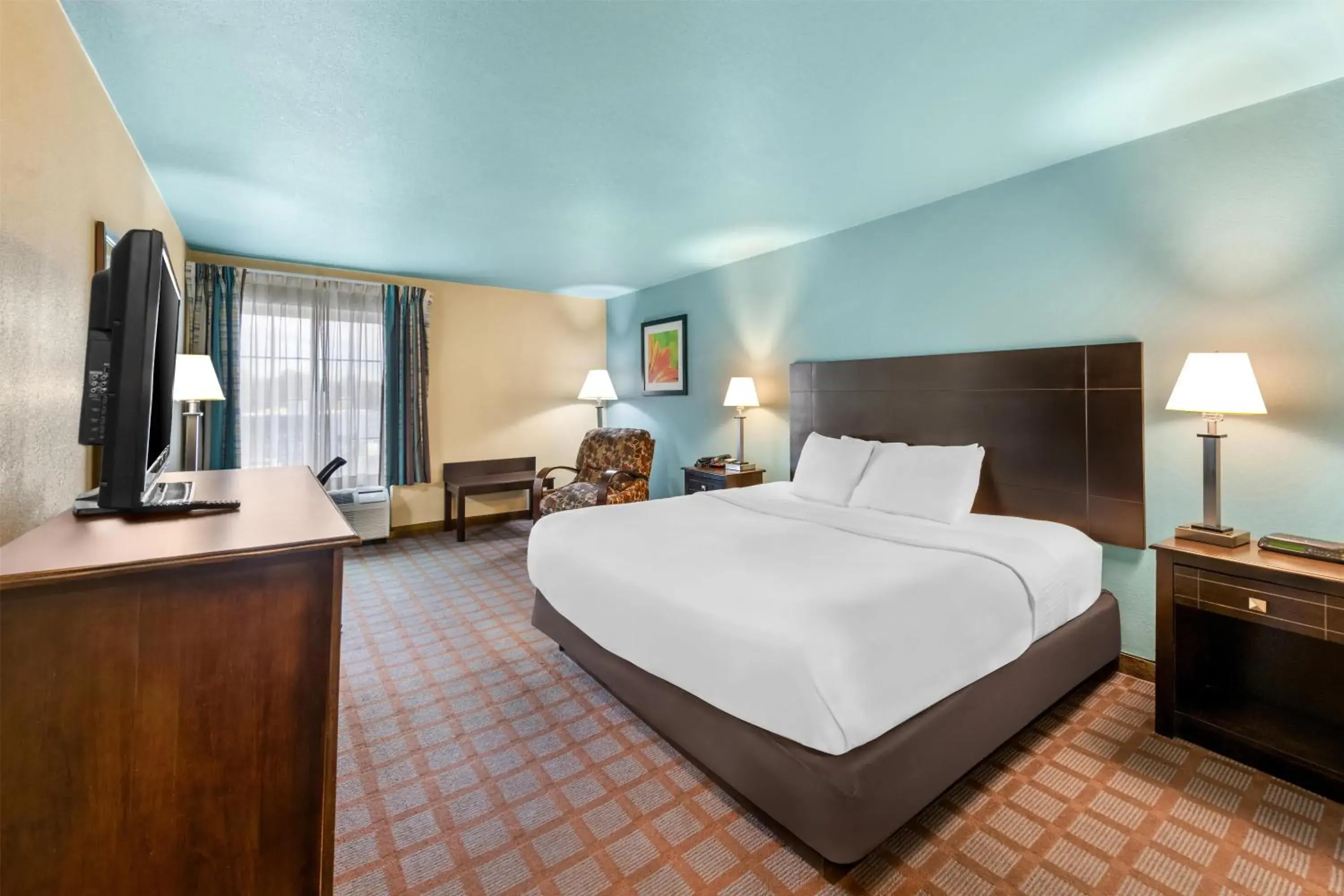 Bedroom, Bed in Red Lion Inn & Suites Blue Springs Bedroom, Bed in Red Lion Inn & Suites Blue Springs