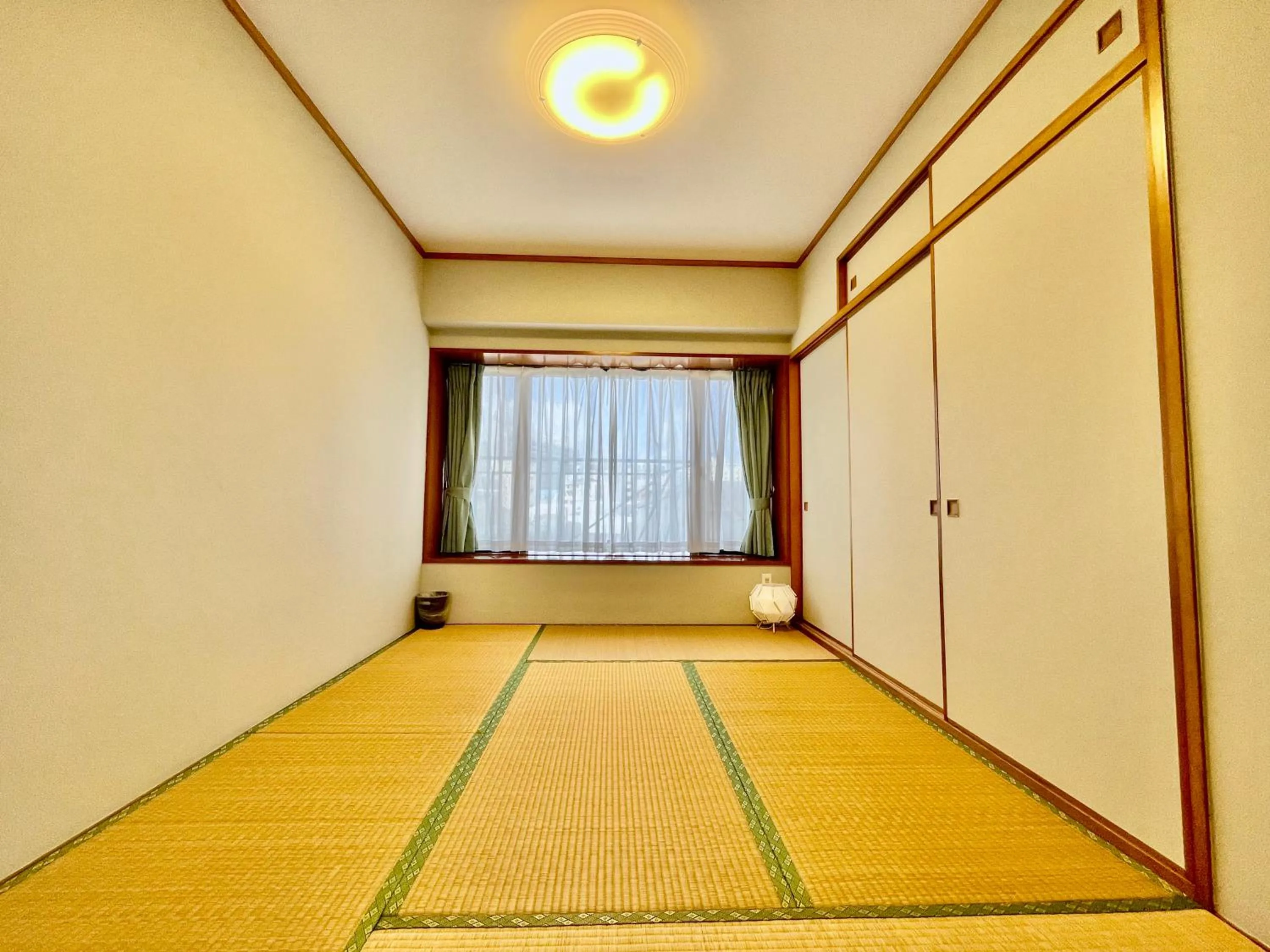 Bed in ホテル天使館 久茂地 -Tenshi-Kan-