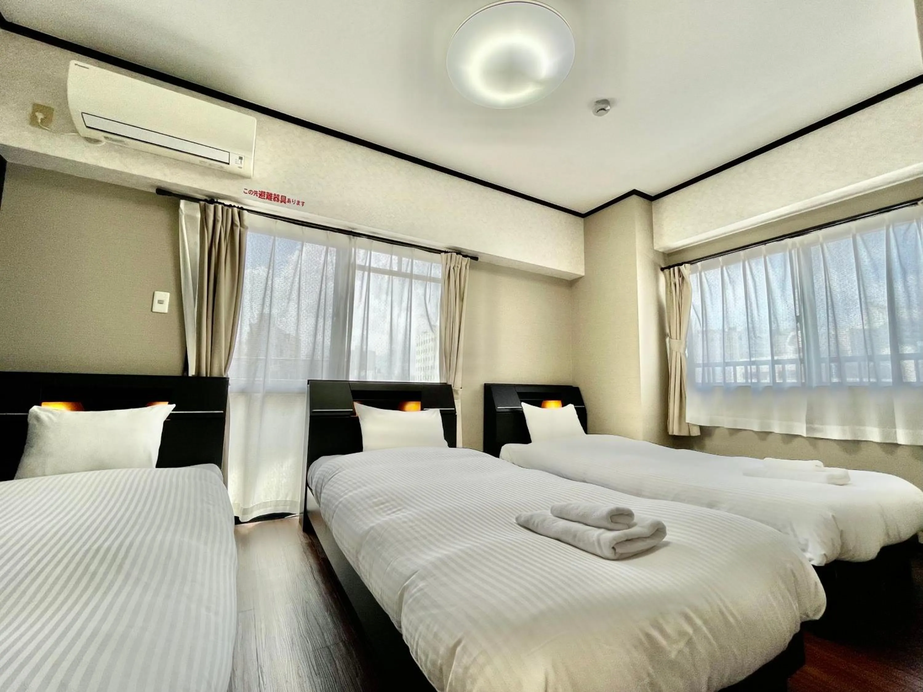 Bed in ホテル天使館 久茂地 -Tenshi-Kan-