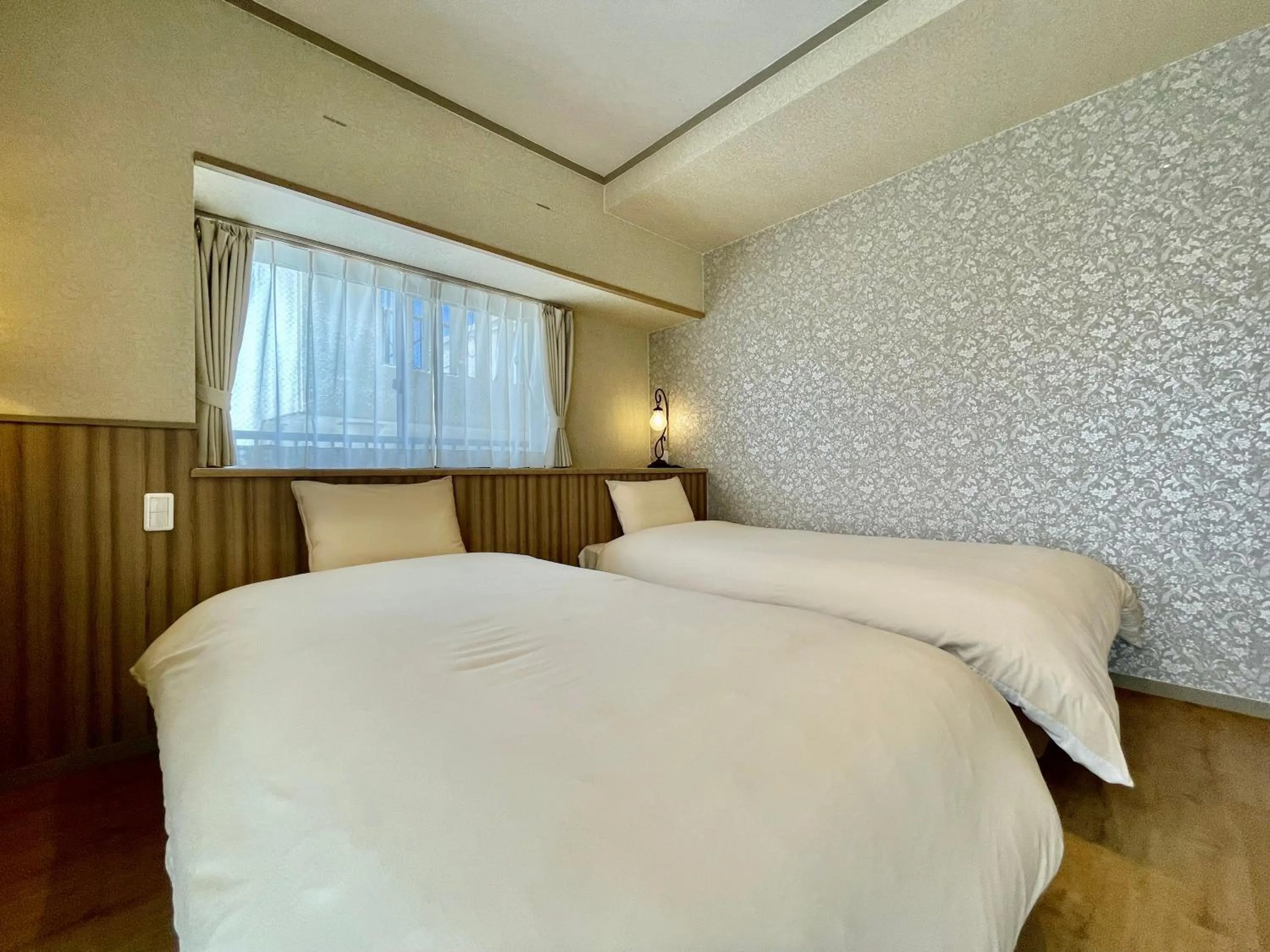 Bed in ホテル天使館 久茂地 -Tenshi-Kan-