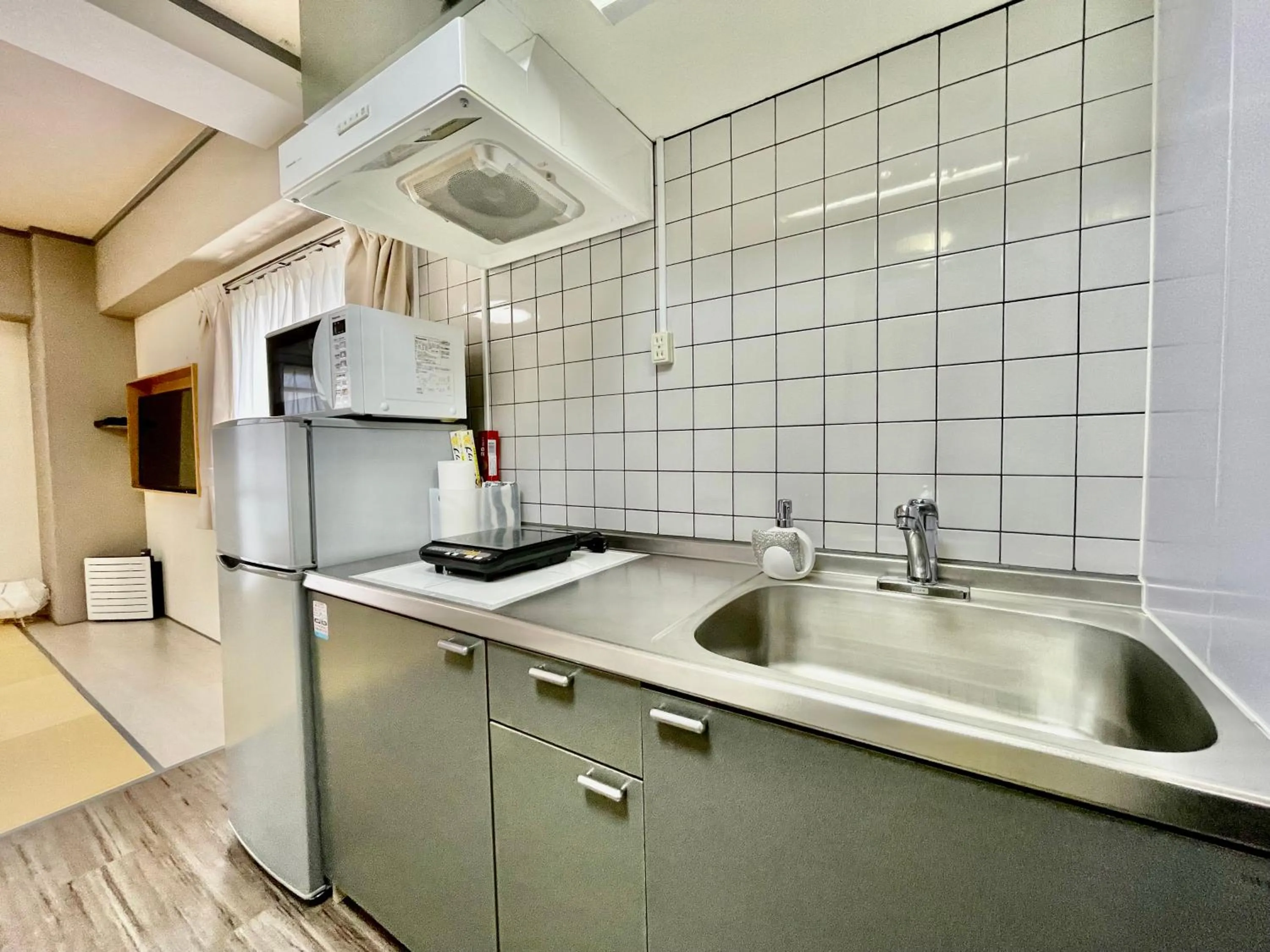 Kitchen or kitchenette in ホテル天使館 久茂地 -Tenshi-Kan-