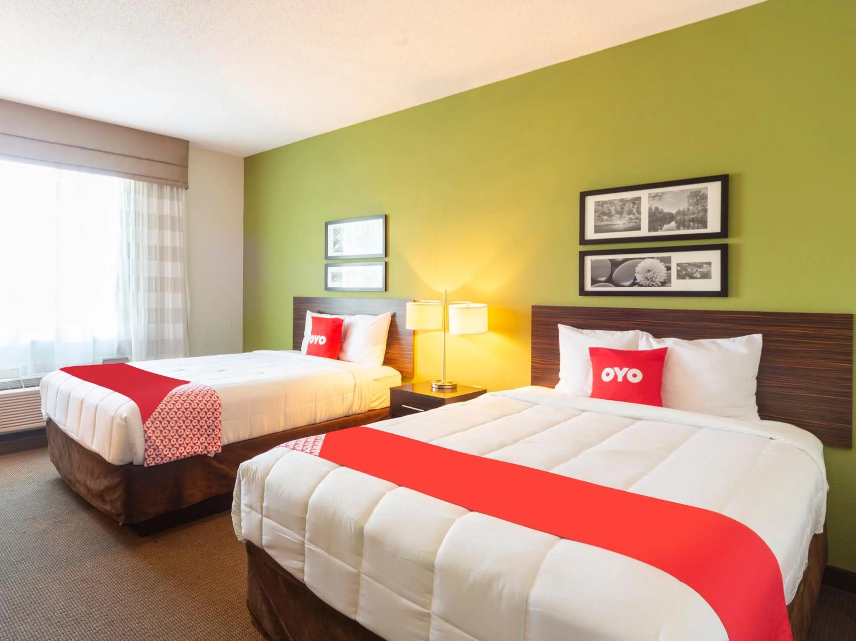 Bedroom in Ramada by Wyndham Jackson MS