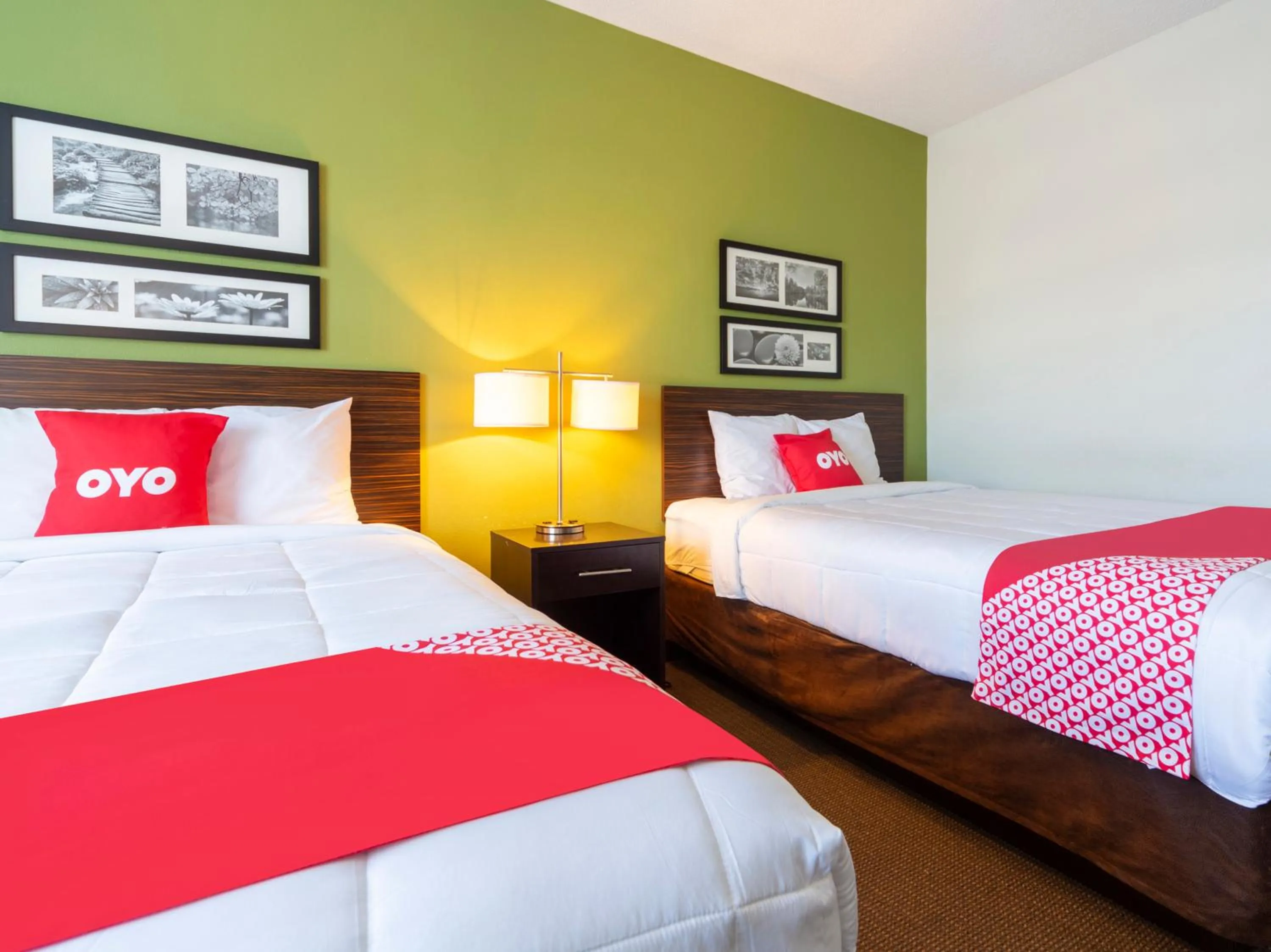 Bedroom in Ramada by Wyndham Jackson MS