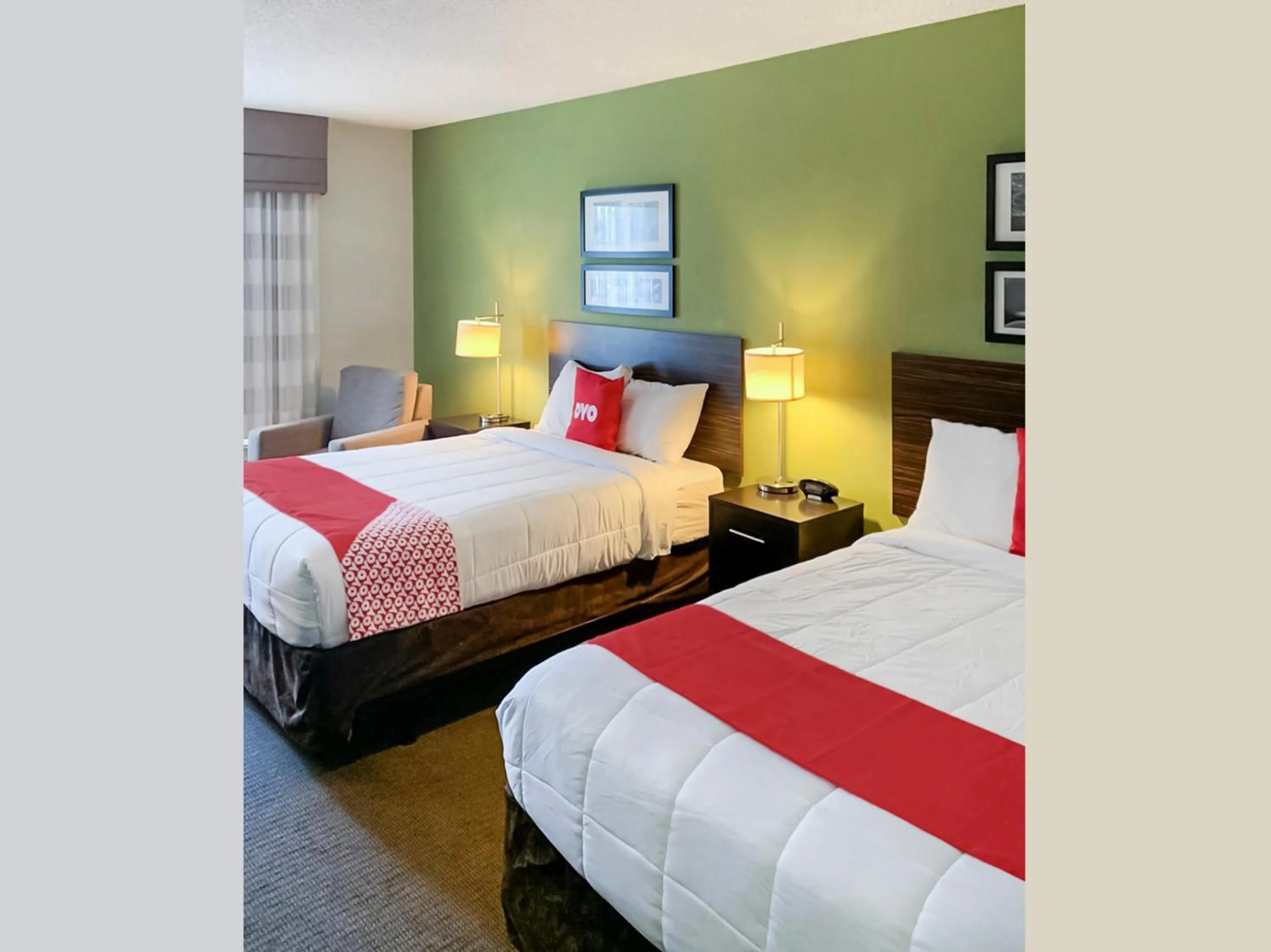 Bedroom in Ramada by Wyndham Jackson MS