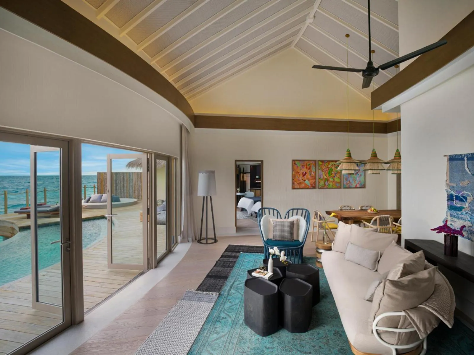 Living room in Intercontinental Maldives Maamunagau Resort with Club benefits by IHG