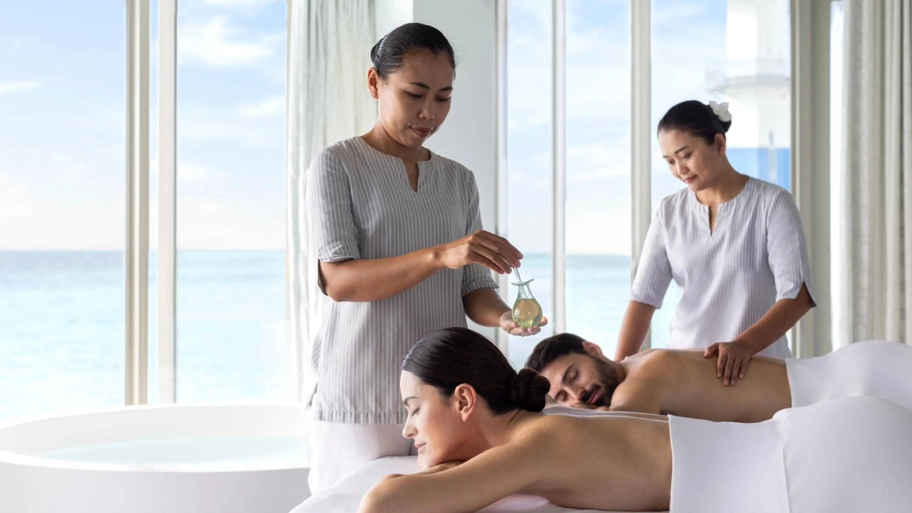 People in Intercontinental Maldives Maamunagau Resort with Club benefits by IHG