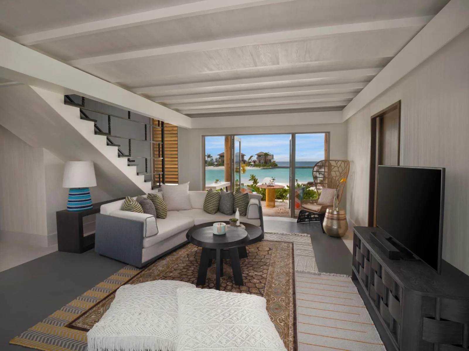 Living room in Intercontinental Maldives Maamunagau Resort with Club benefits by IHG