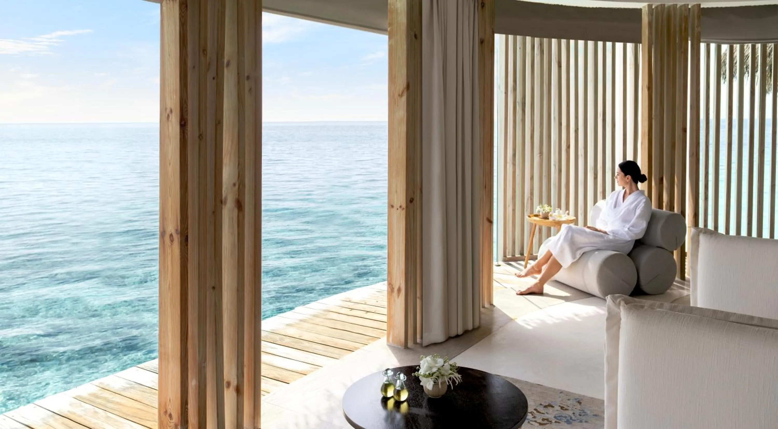 People in Intercontinental Maldives Maamunagau Resort with Club benefits by IHG