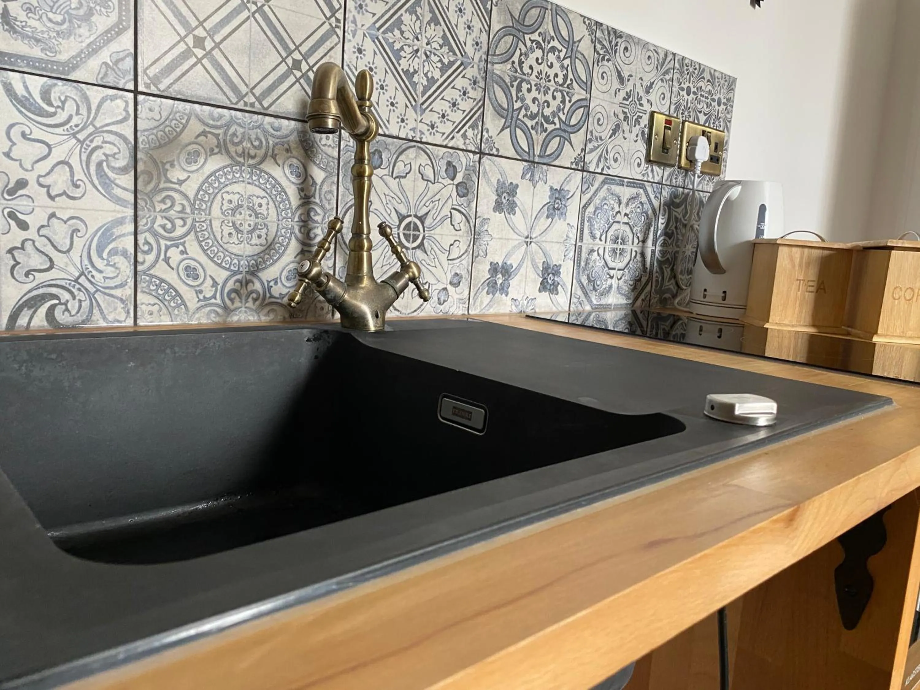 Kitchen or kitchenette in Queen Street Boutique Suites