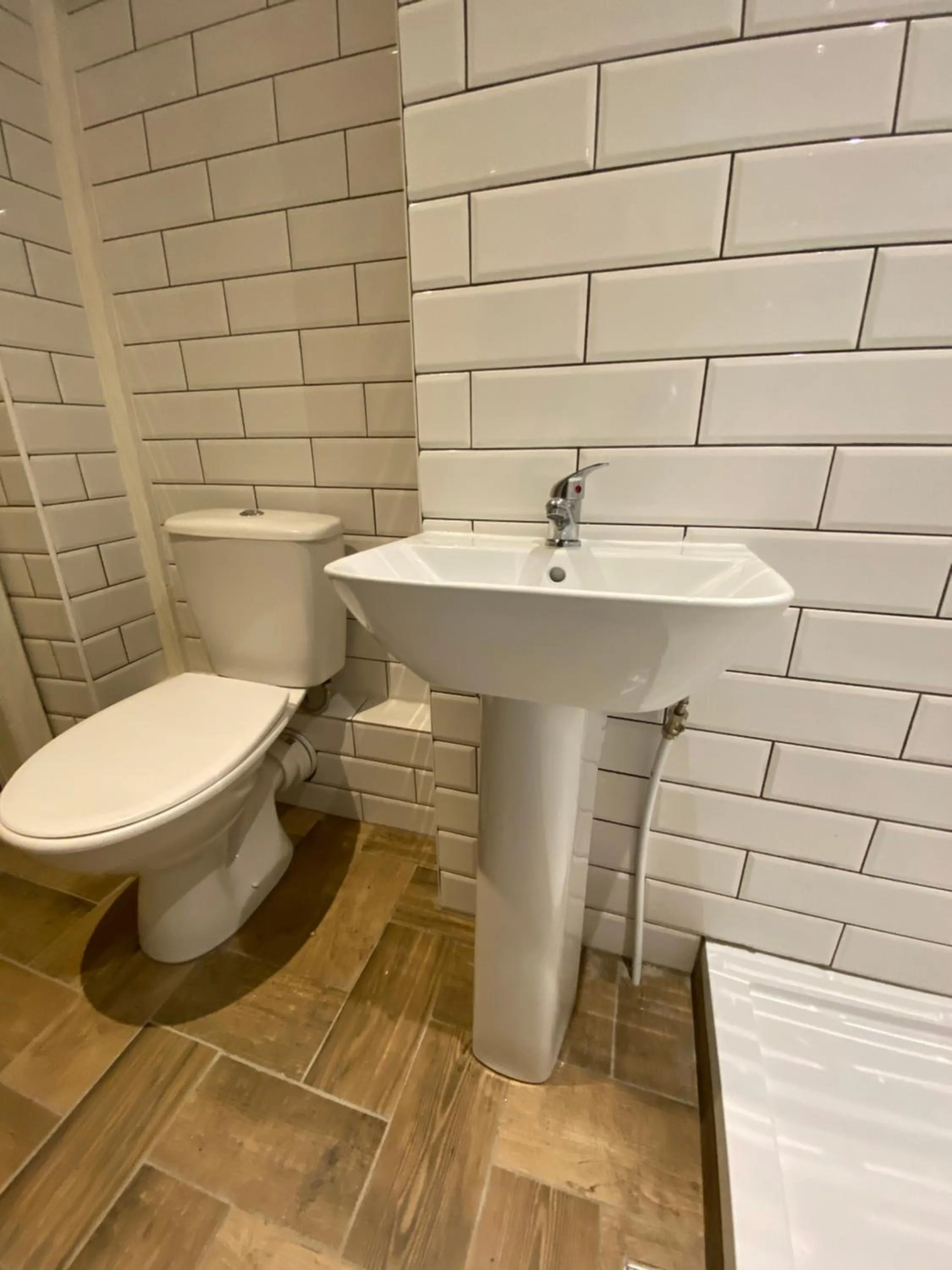 Toilet in Queen Street Boutique Suites