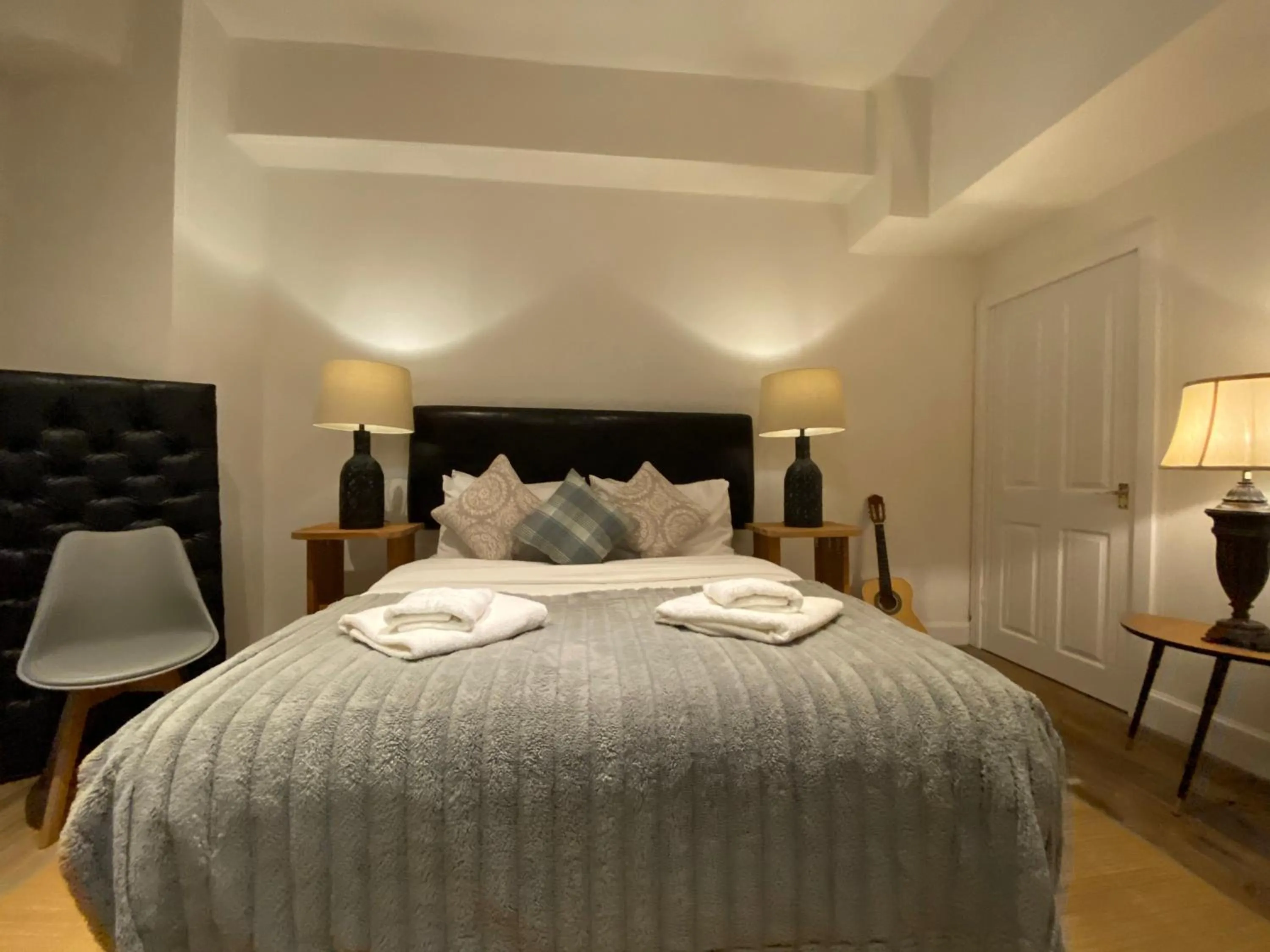 Bed in Queen Street Boutique Suites