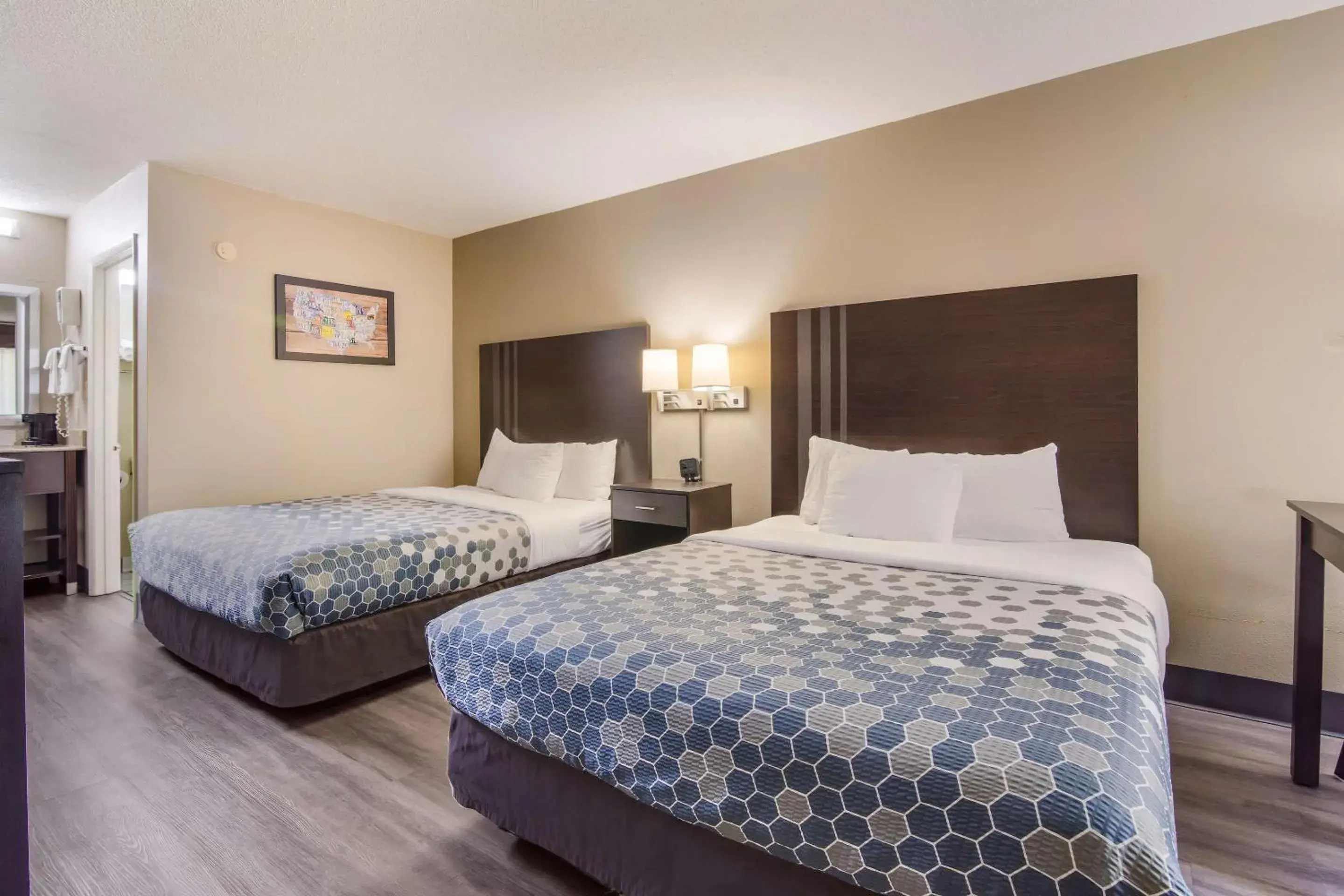 Bedroom, Bed in Econo Lodge Garner - Raleigh Bedroom, Bed in Econo Lodge Garner - Raleigh