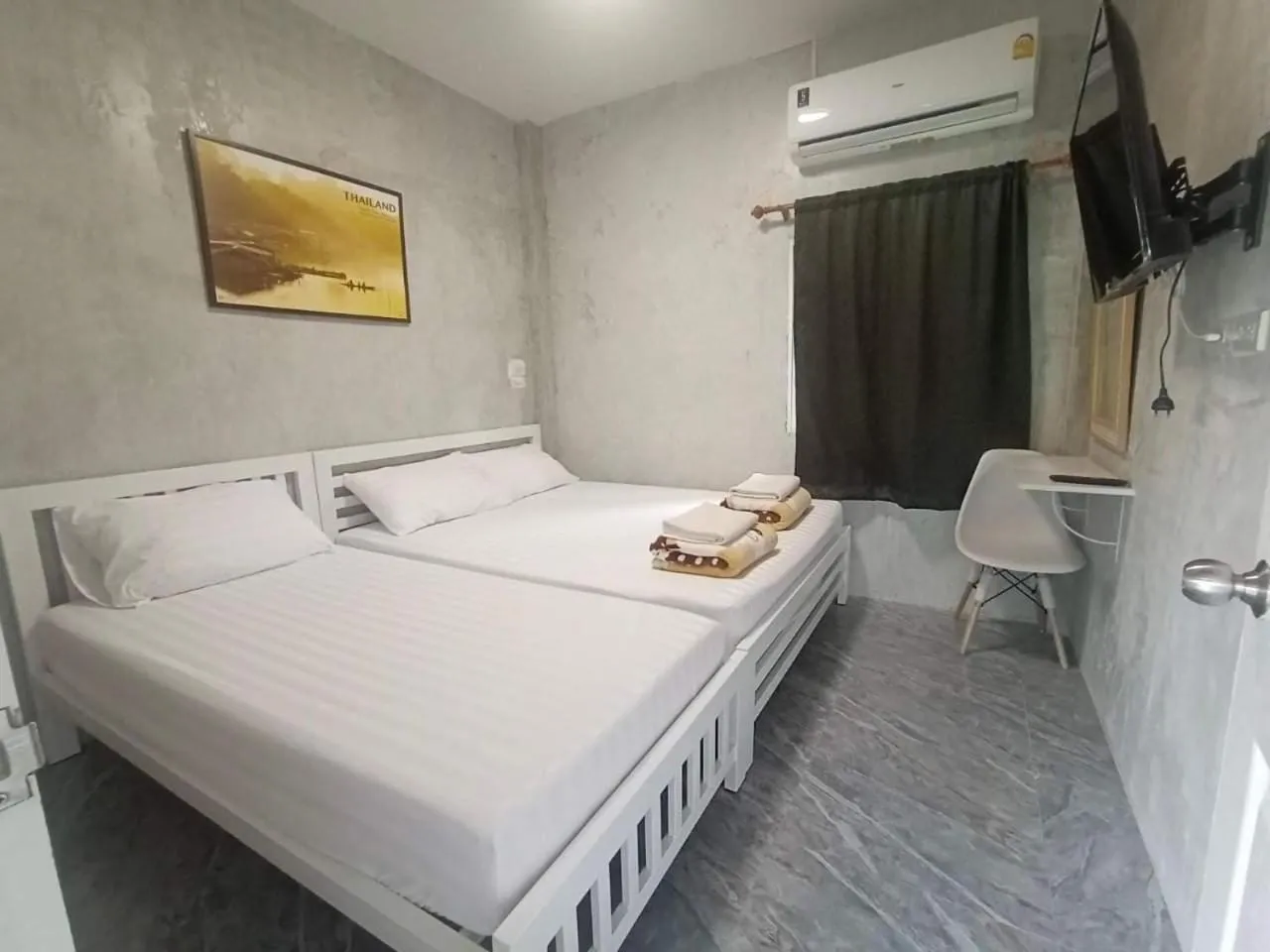 Bed in Baan Rabiangdao UthaiThani