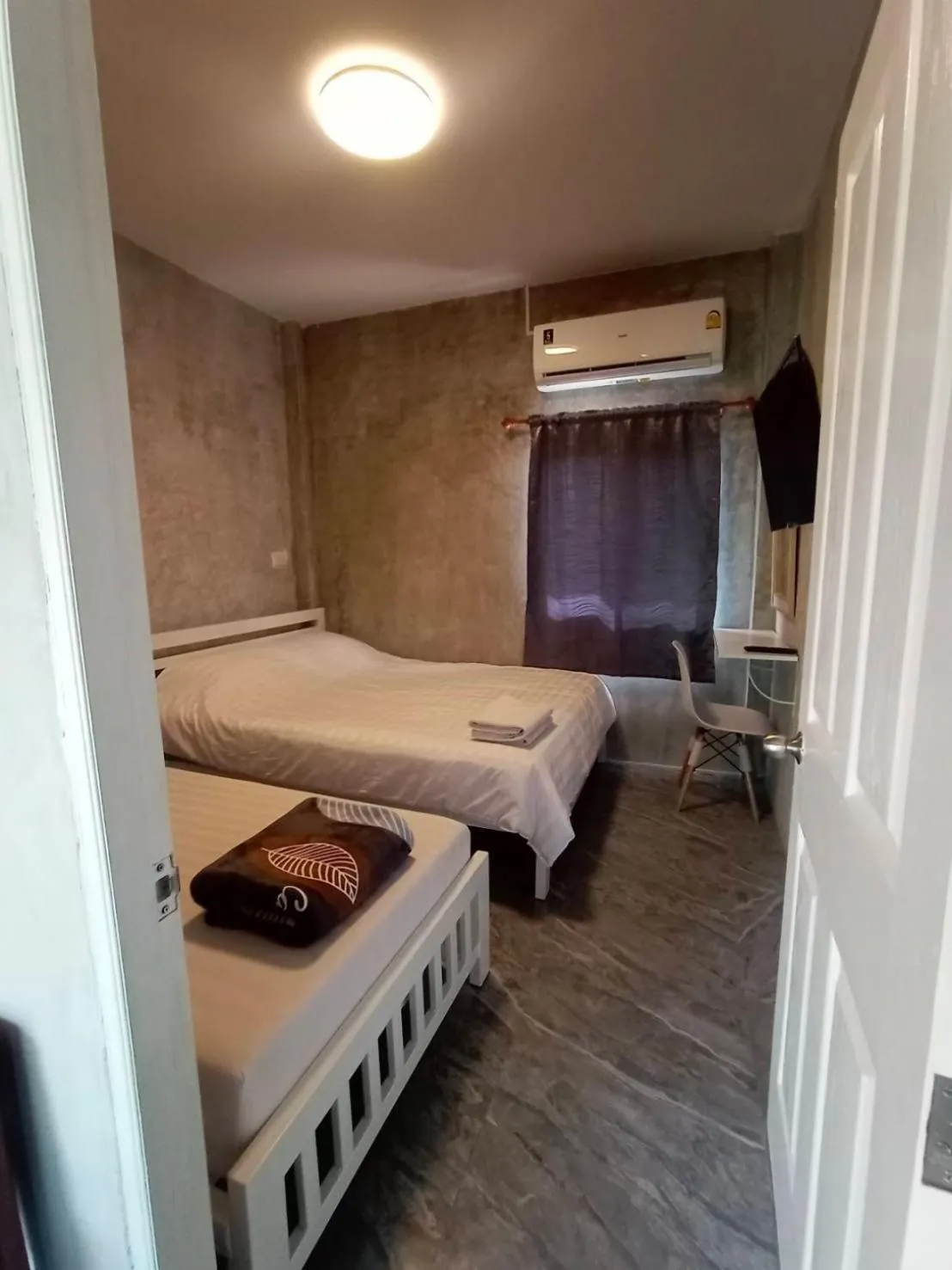 Bed in Baan Rabiangdao UthaiThani