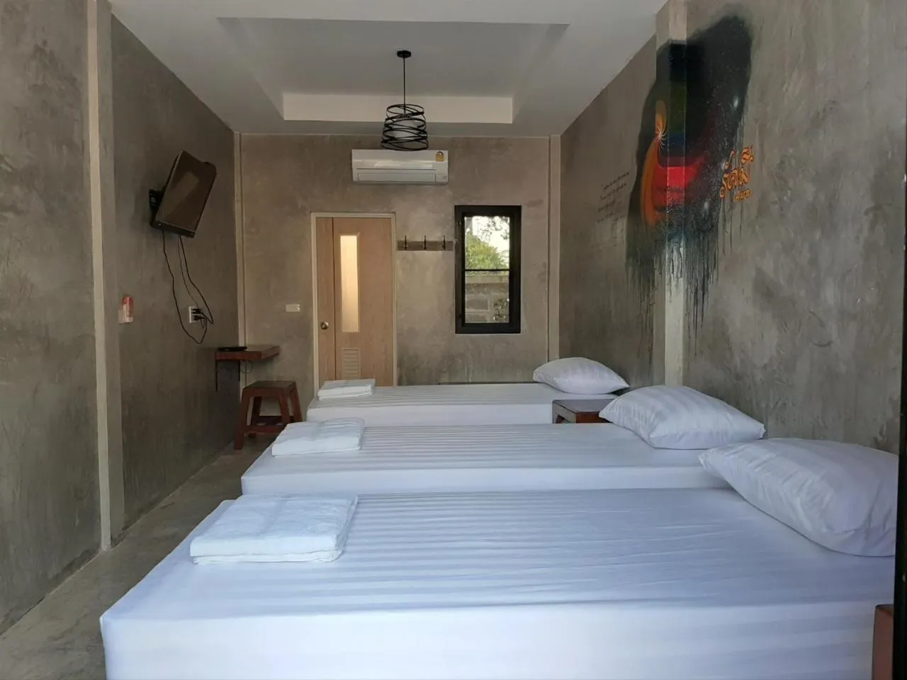 Bed in Baan Rabiangdao UthaiThani