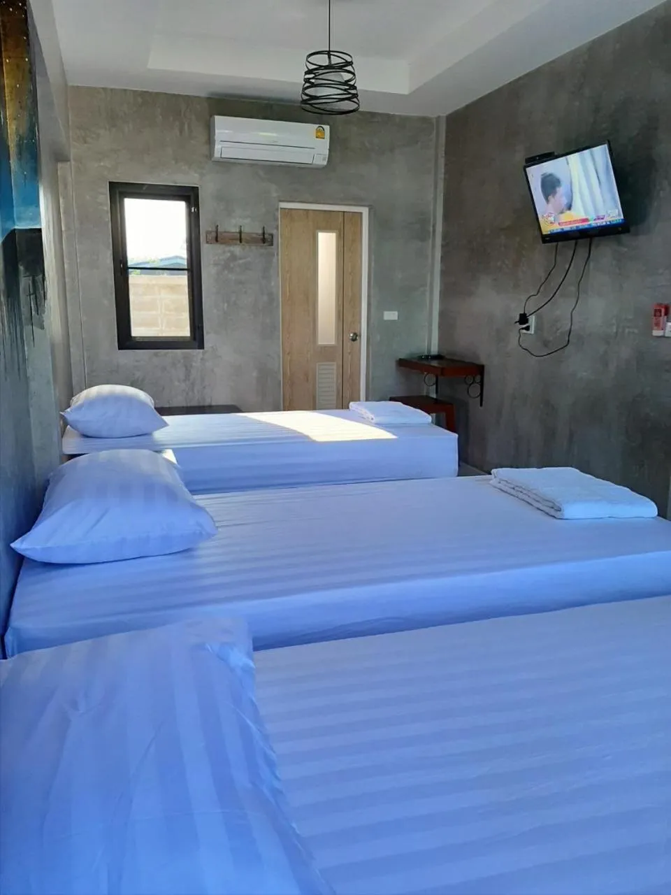 Bed in Baan Rabiangdao UthaiThani