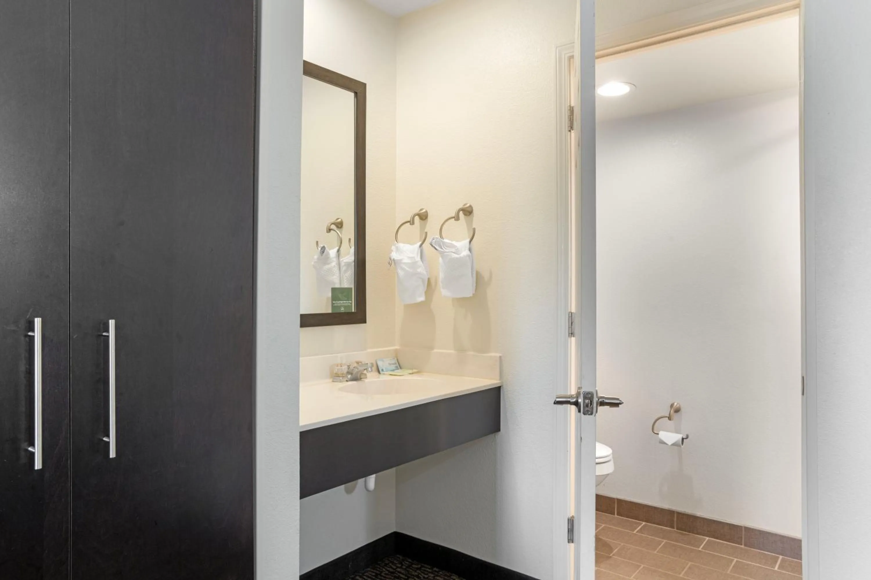 Bedroom in Sleep Inn & Suites at Concord Mills