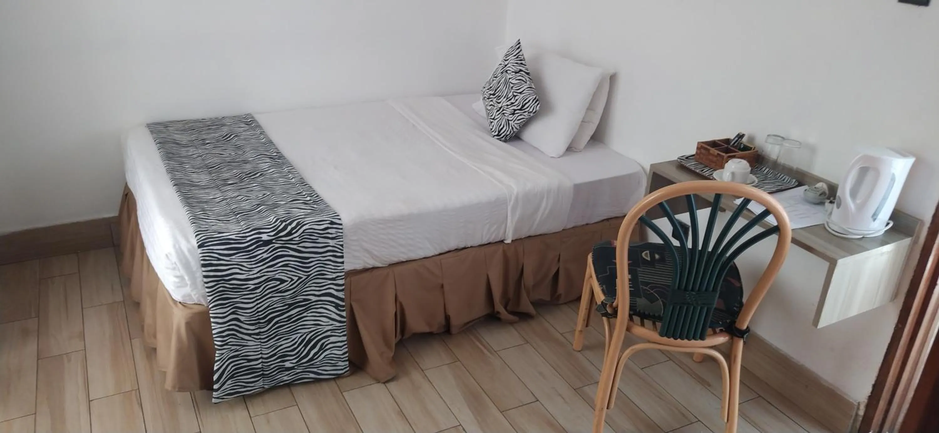 Photo of the whole room, Bed in Plus254 Hotel