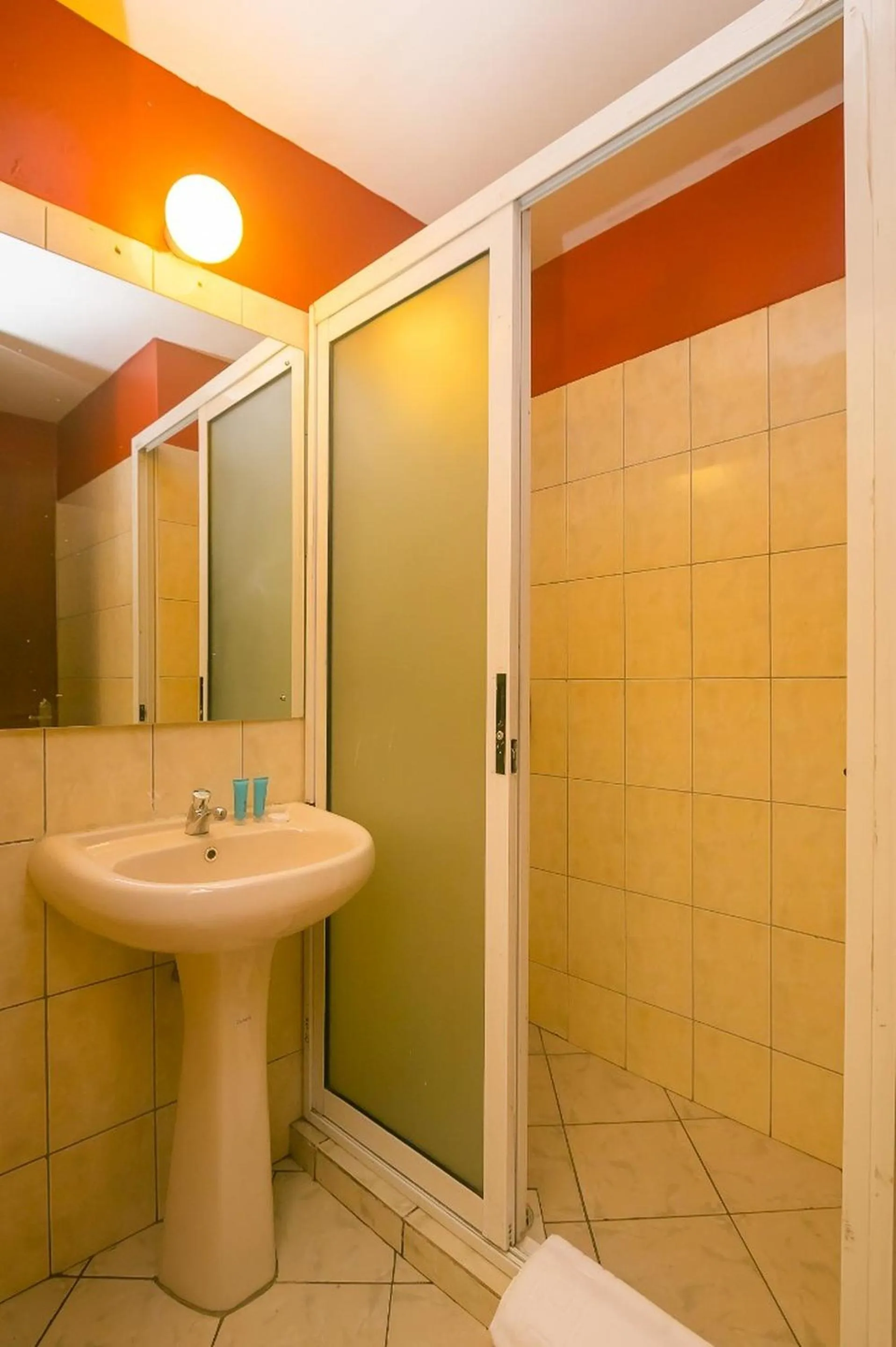 Bathroom in Plus254 Hotel