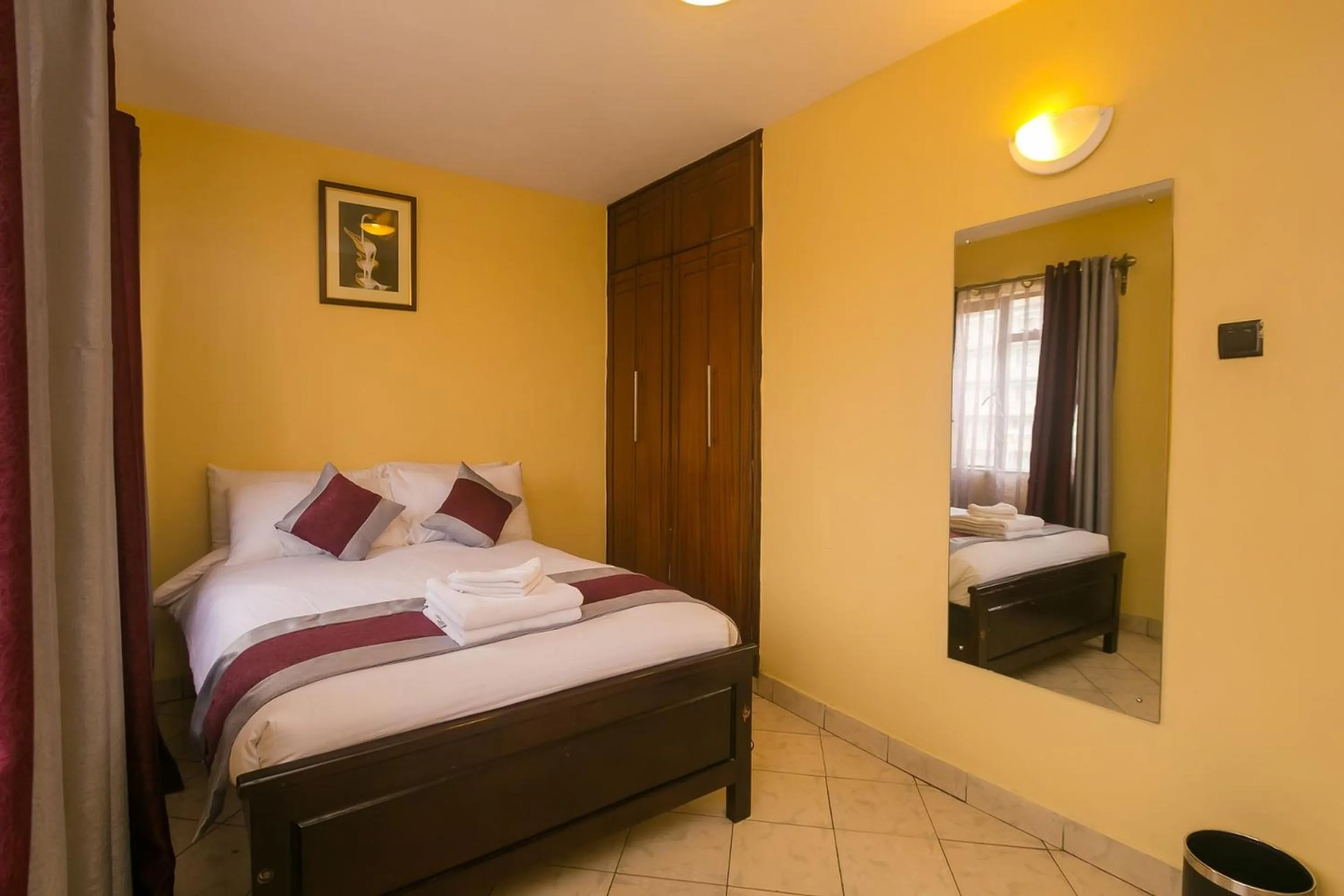 Bed in Plus254 Hotel