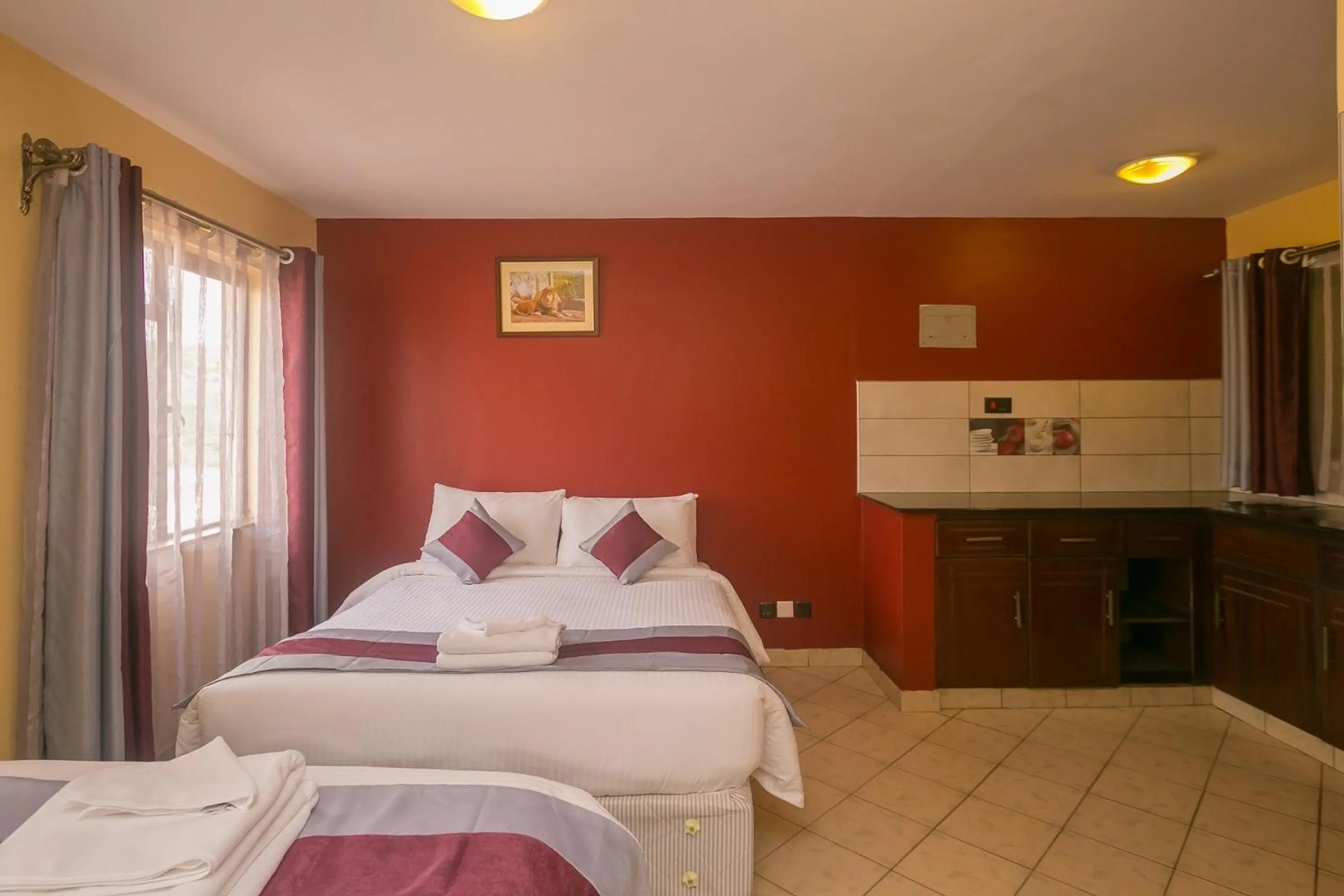 Bed in Plus254 Hotel