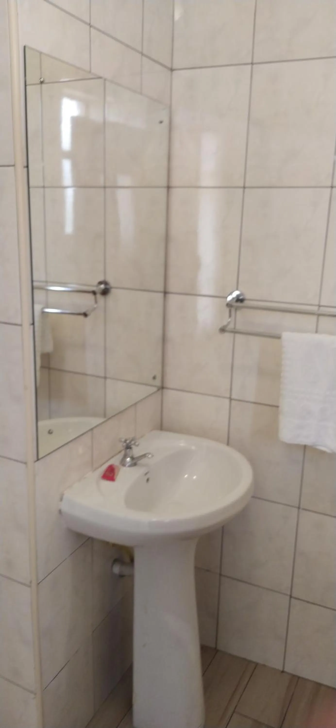 Bathroom in Plus254 Hotel