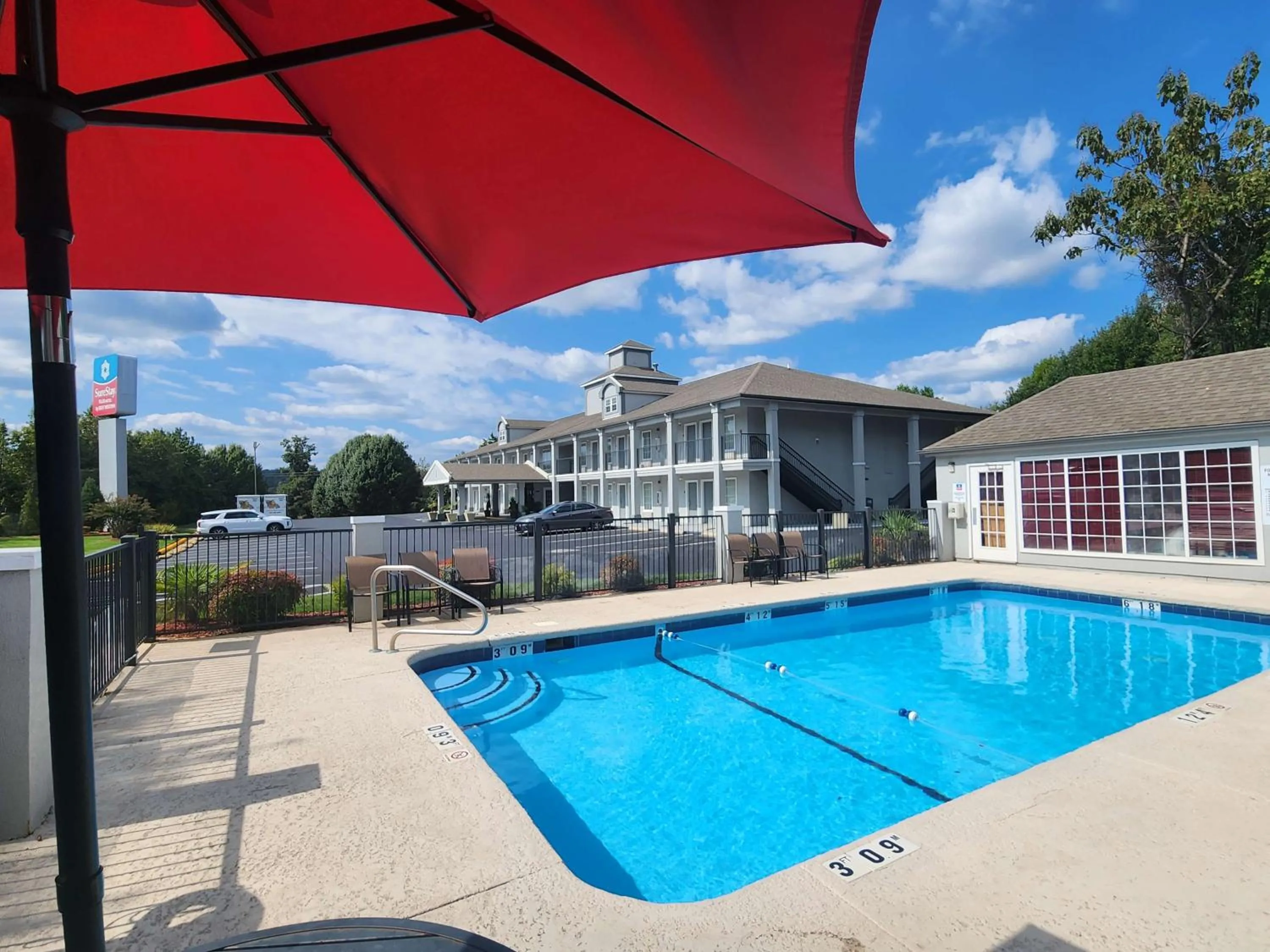 Pool view in SureStay Plus Hotel by Best Western Asheboro