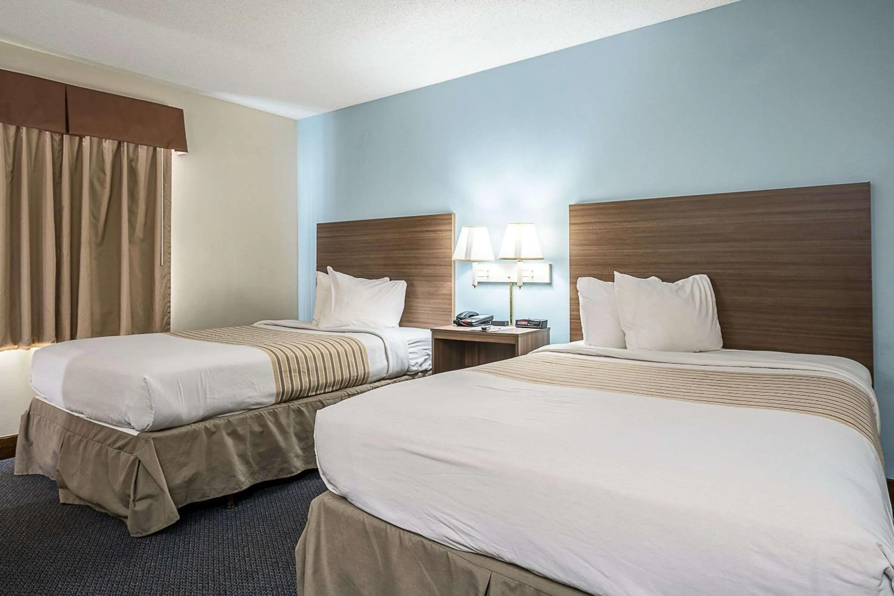 Bedroom, Bed in Suburban Studios of Wilmington