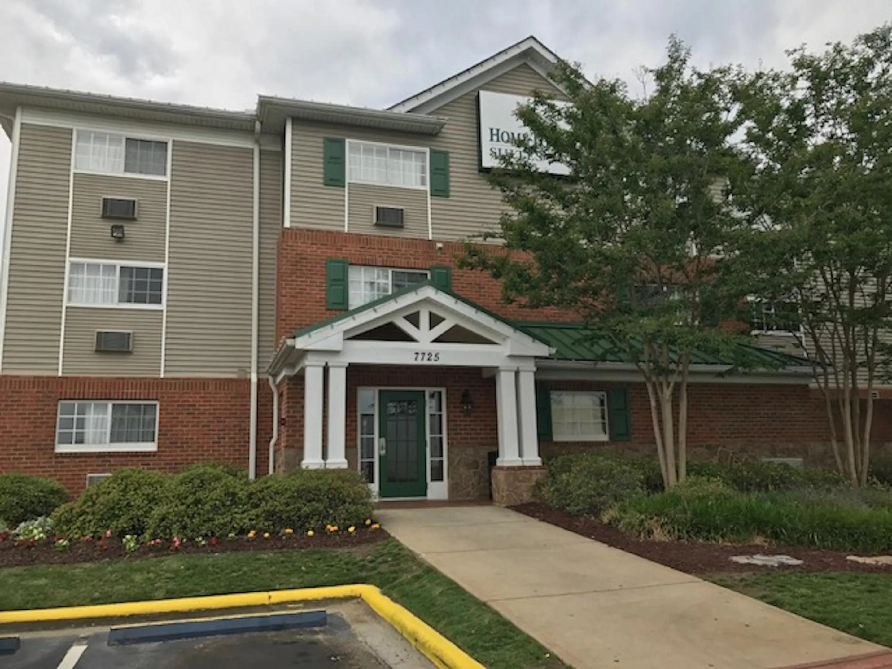 Property building in HomeTowne Studios & Suites by Red Roof Charlotte - Concord