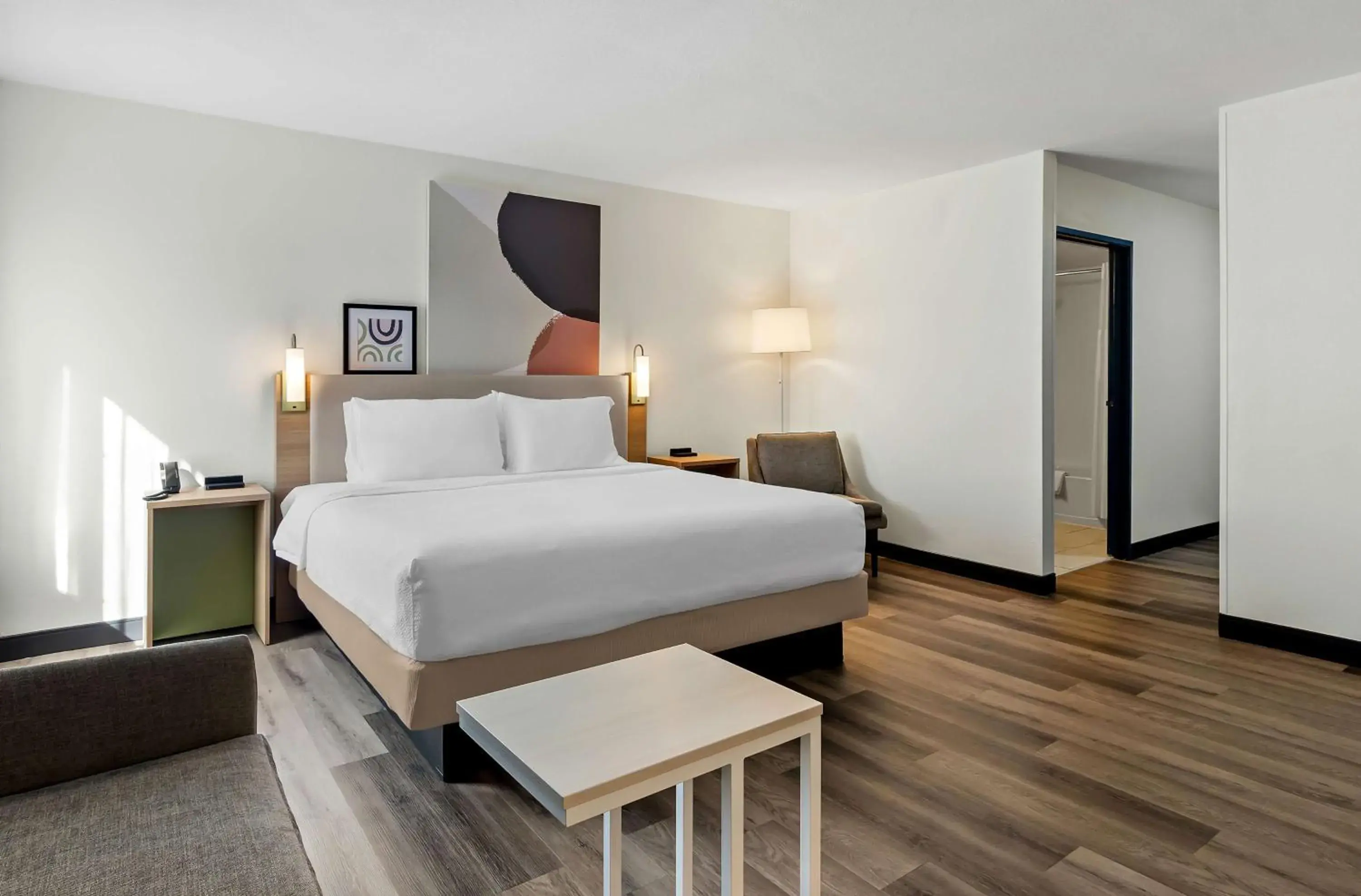 Living room, Bed in Spark by Hilton Winston-Salem University Living room, Bed in Spark by Hilton Winston-Salem University