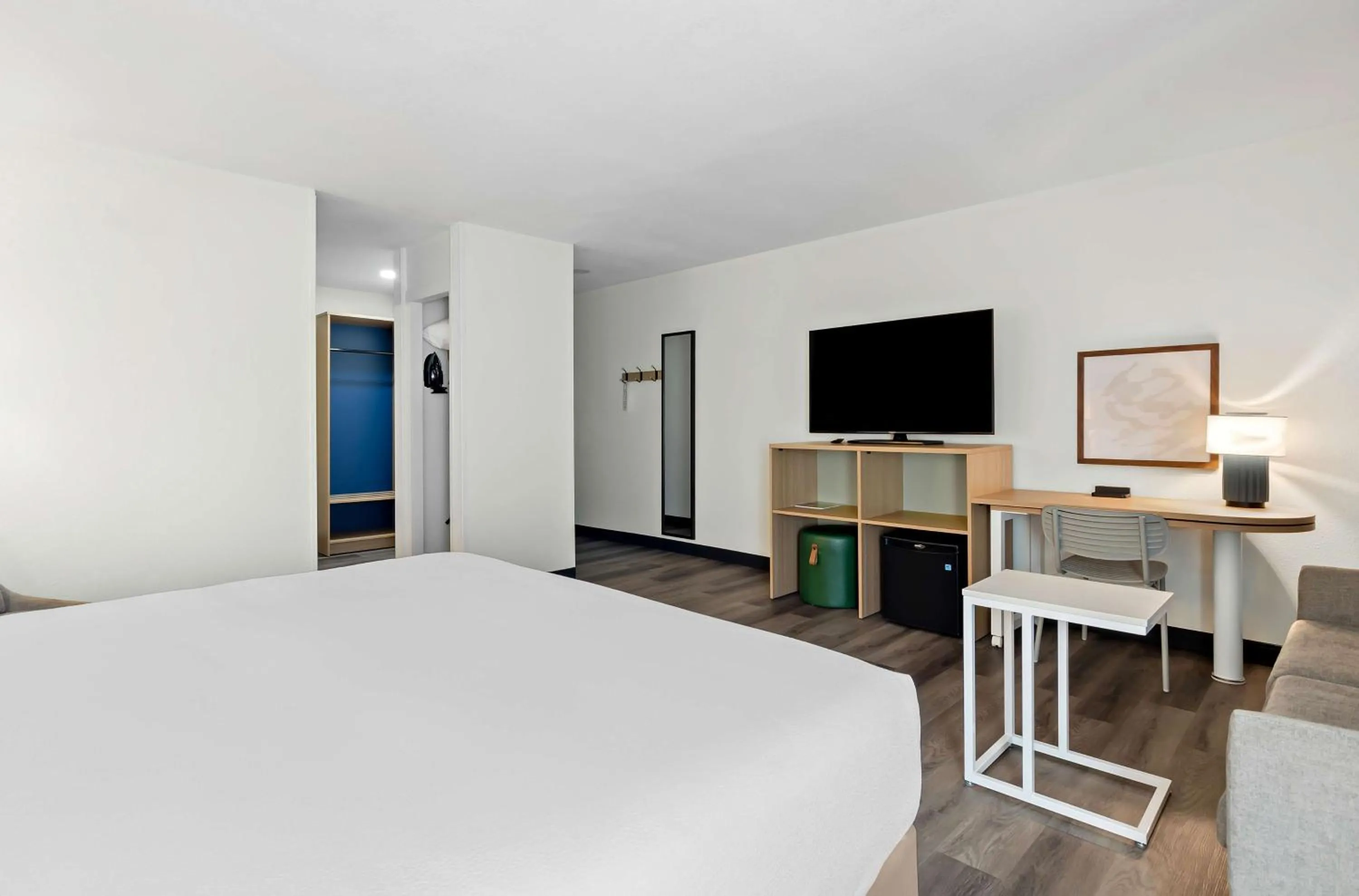 Living room, Bed in Spark by Hilton Winston-Salem University