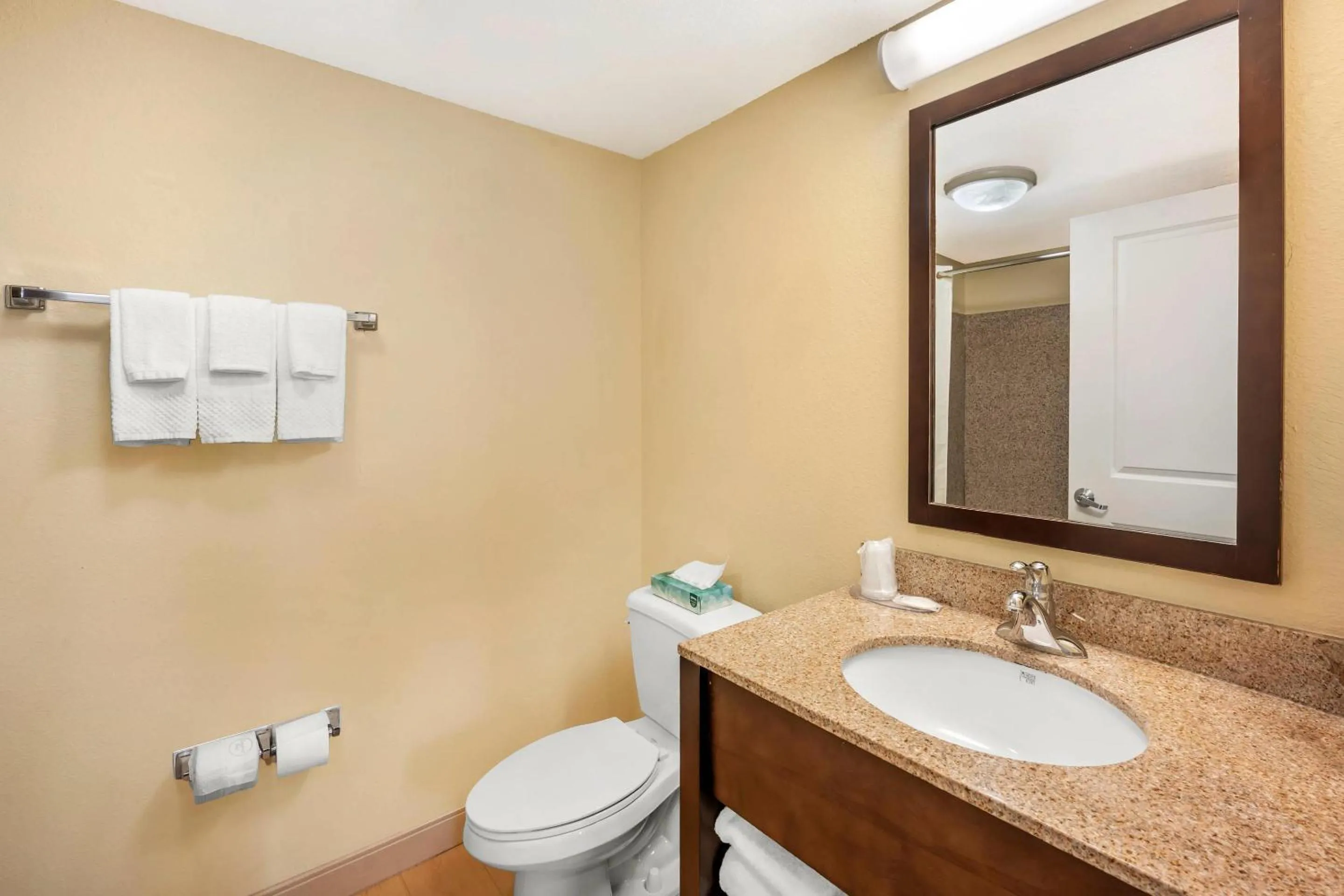 Bedroom in MainStay Suites Jacksonville near Camp Lejeune