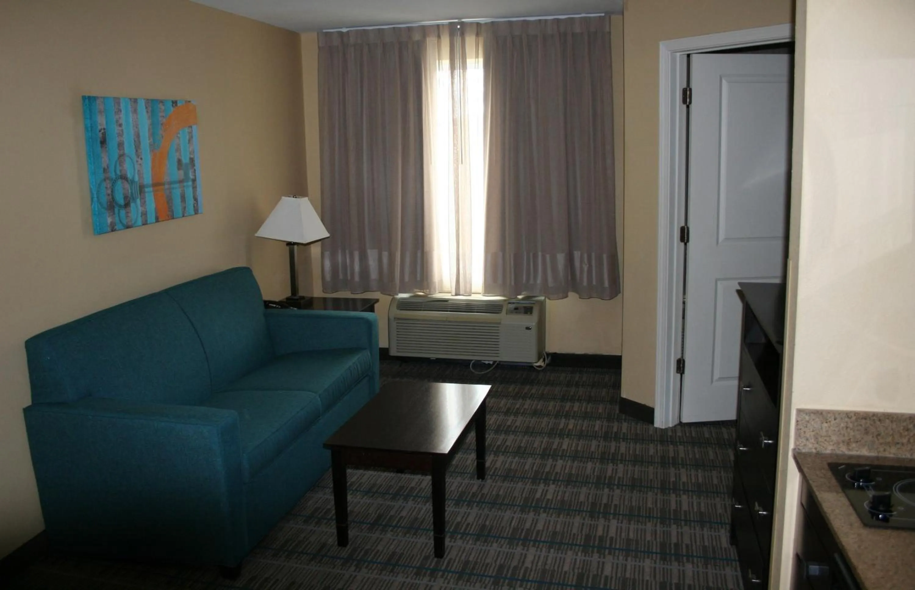 Living room in MainStay Suites Jacksonville near Camp Lejeune