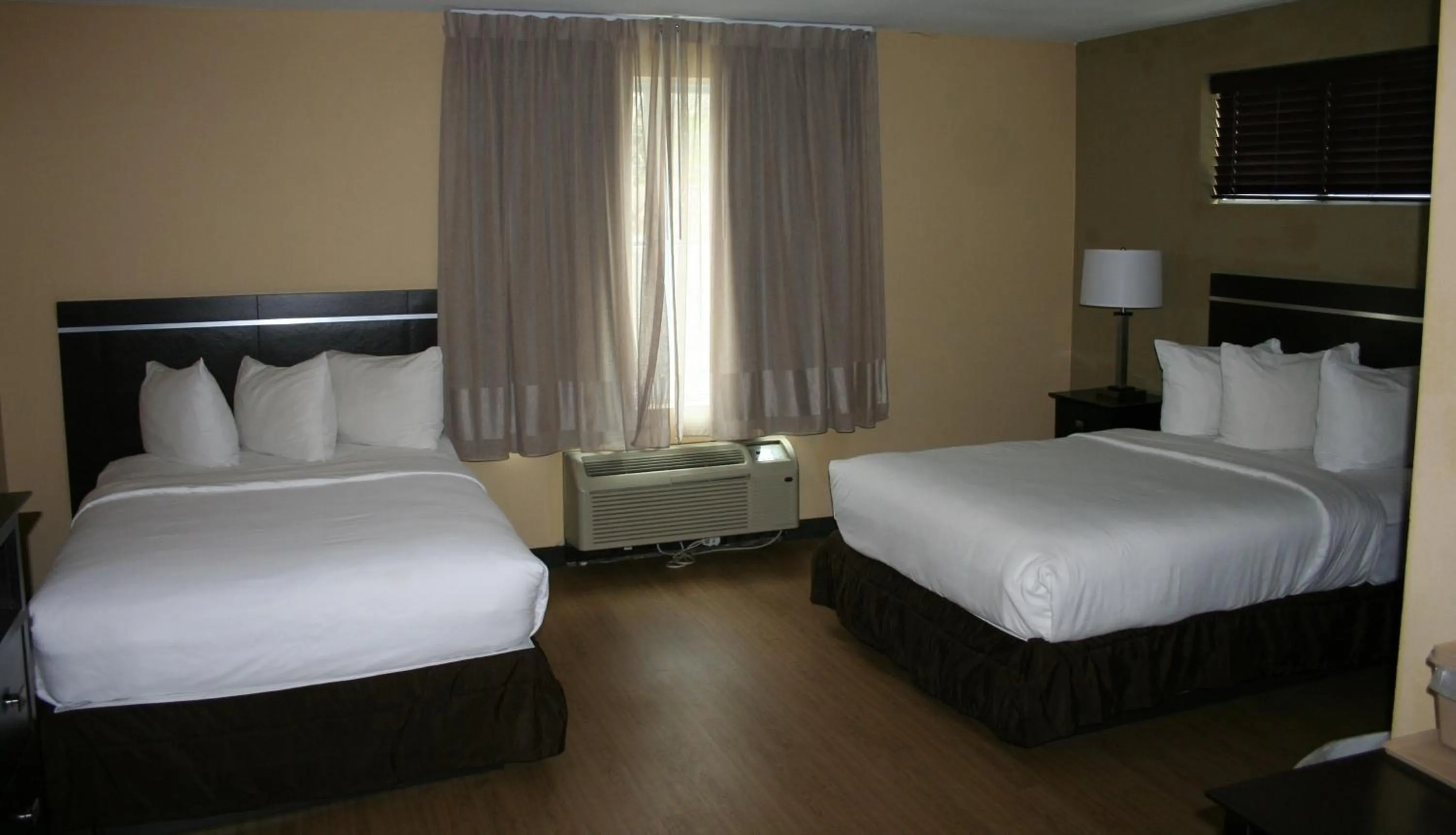 Bedroom, Bed in MainStay Suites Jacksonville near Camp Lejeune