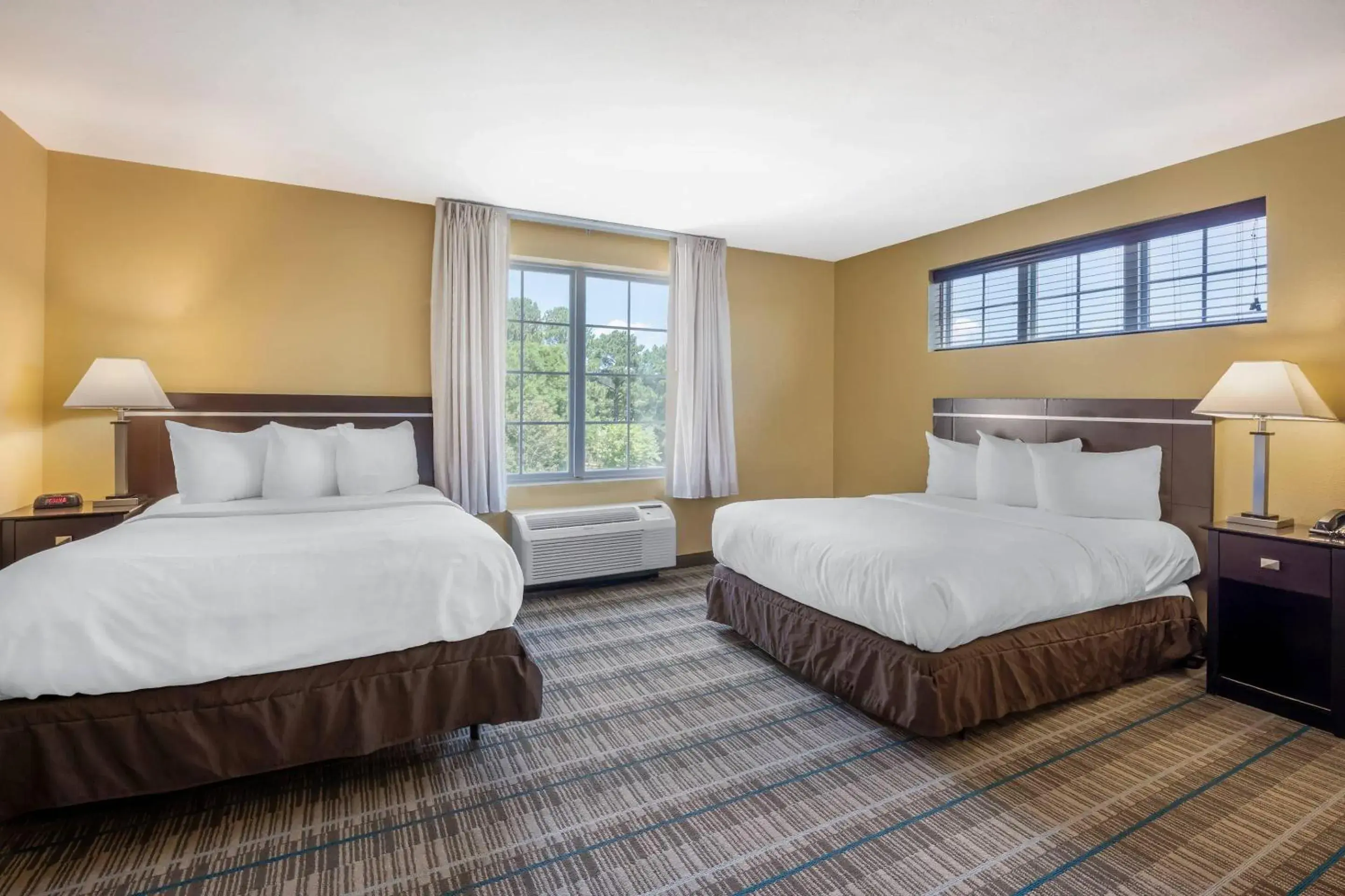 Bedroom, Bed in MainStay Suites Jacksonville near Camp Lejeune Bedroom, Bed in MainStay Suites Jacksonville near Camp Lejeune