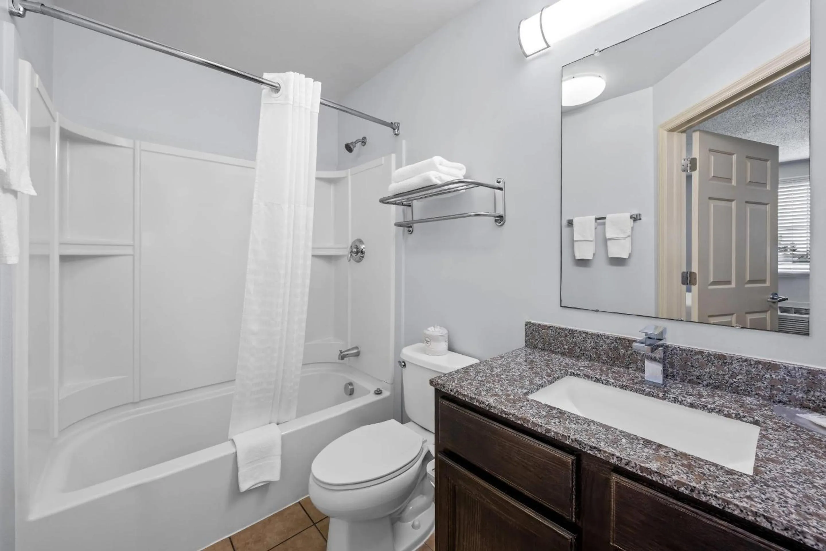 Bedroom in Suburban Studios Near Camp Lejeune