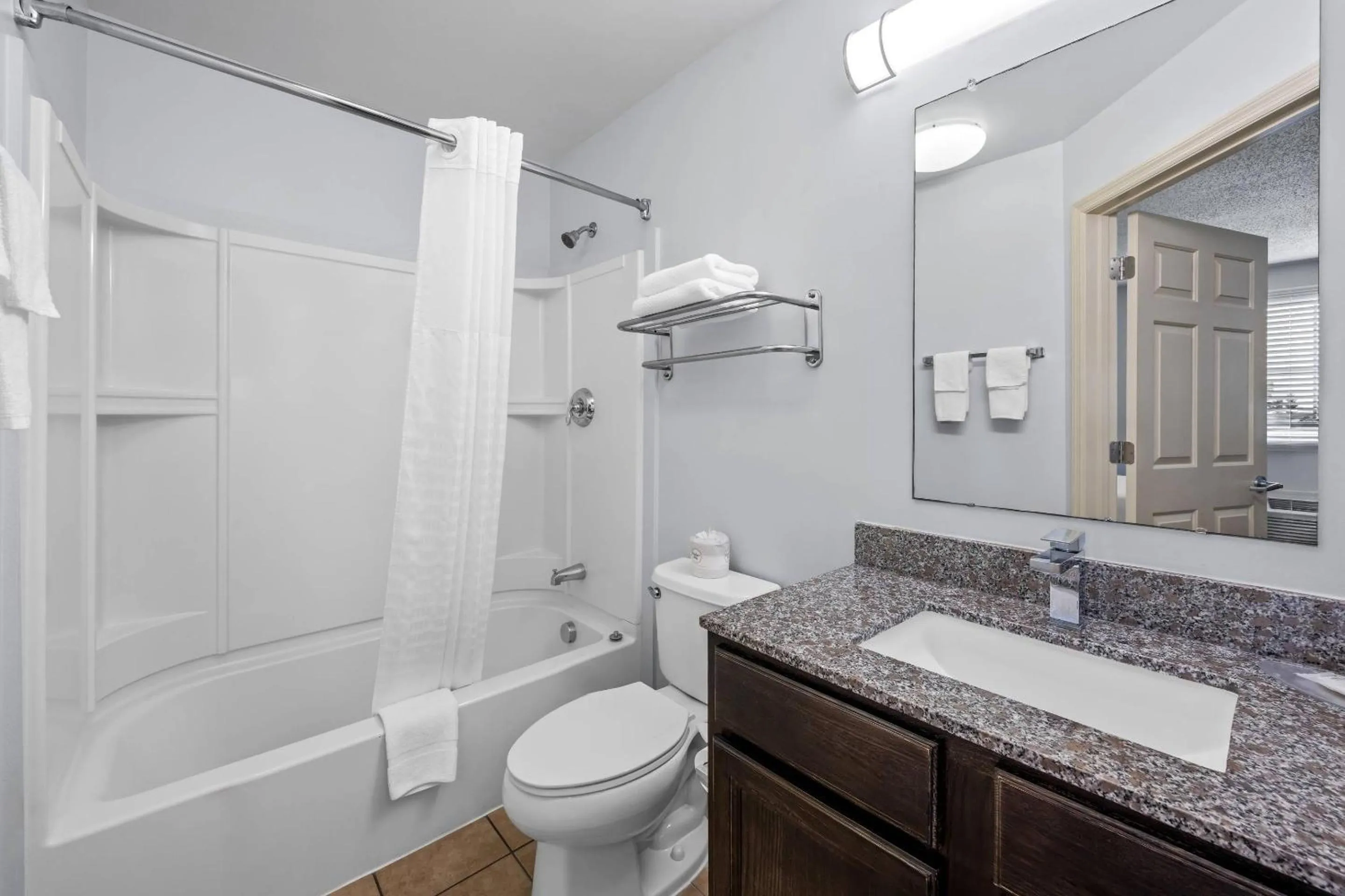 Bedroom in Suburban Studios Near Camp Lejeune