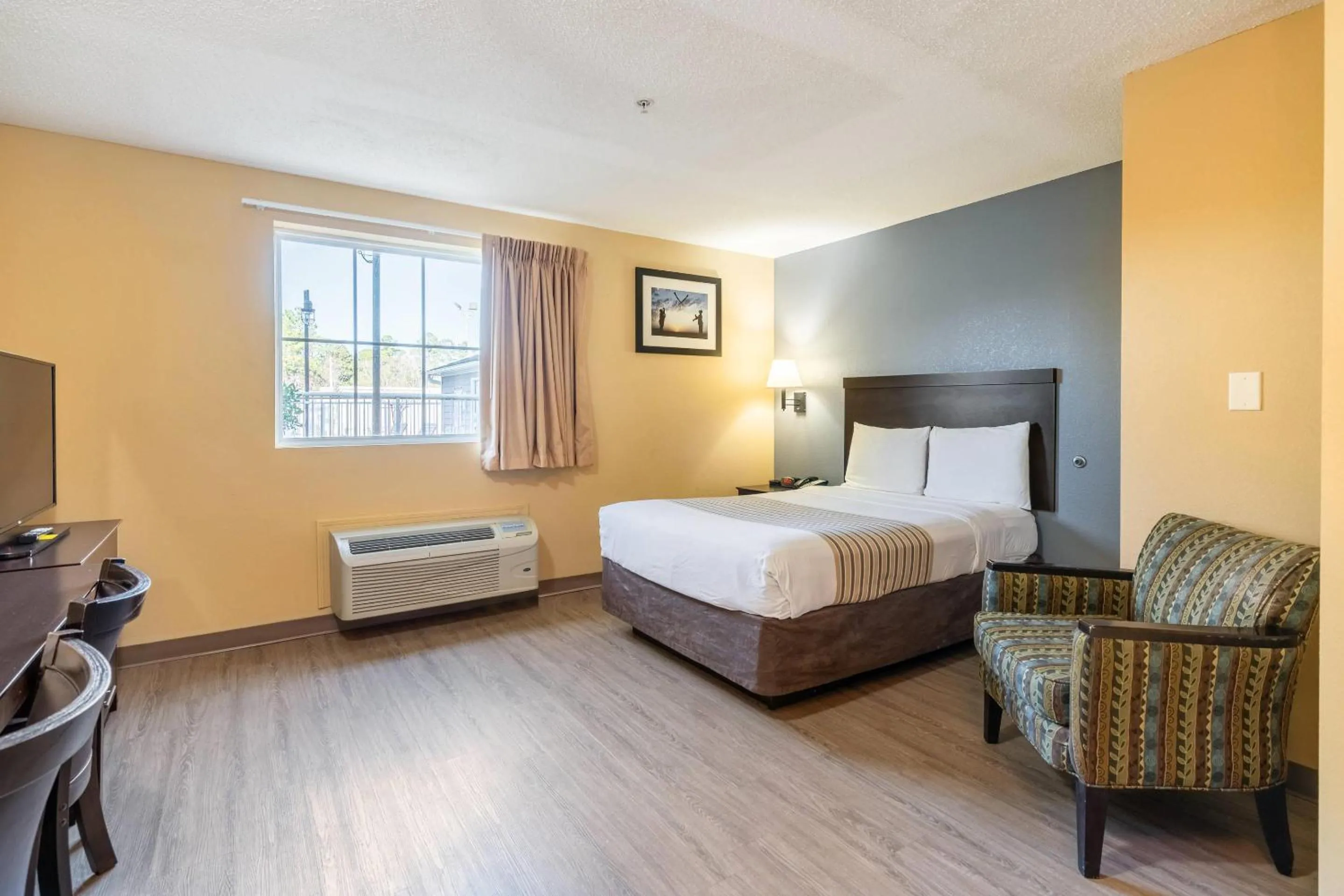 Bedroom, Bed in Suburban Studios Near Camp Lejeune
