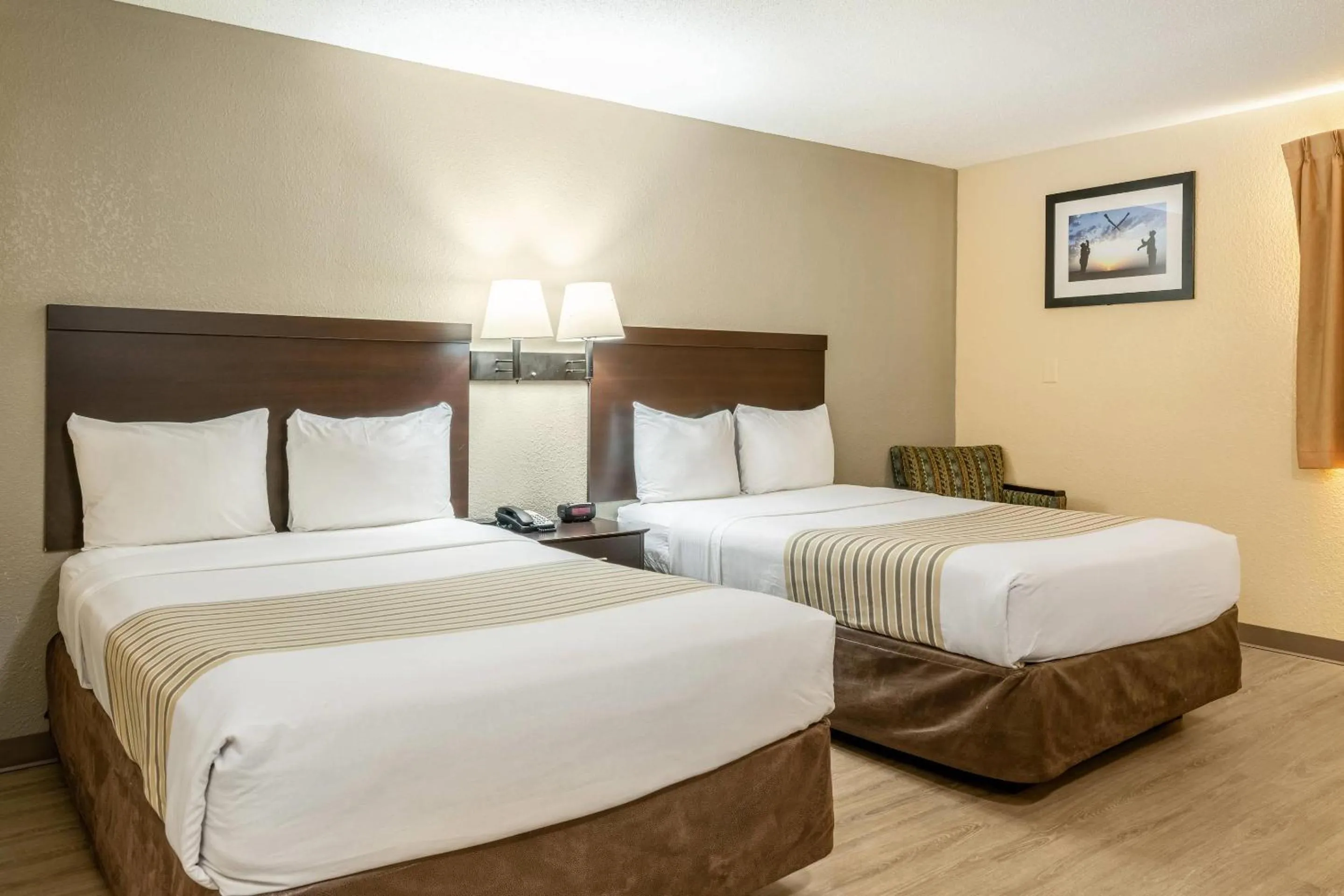 Bedroom, Bed in Suburban Studios Near Camp Lejeune