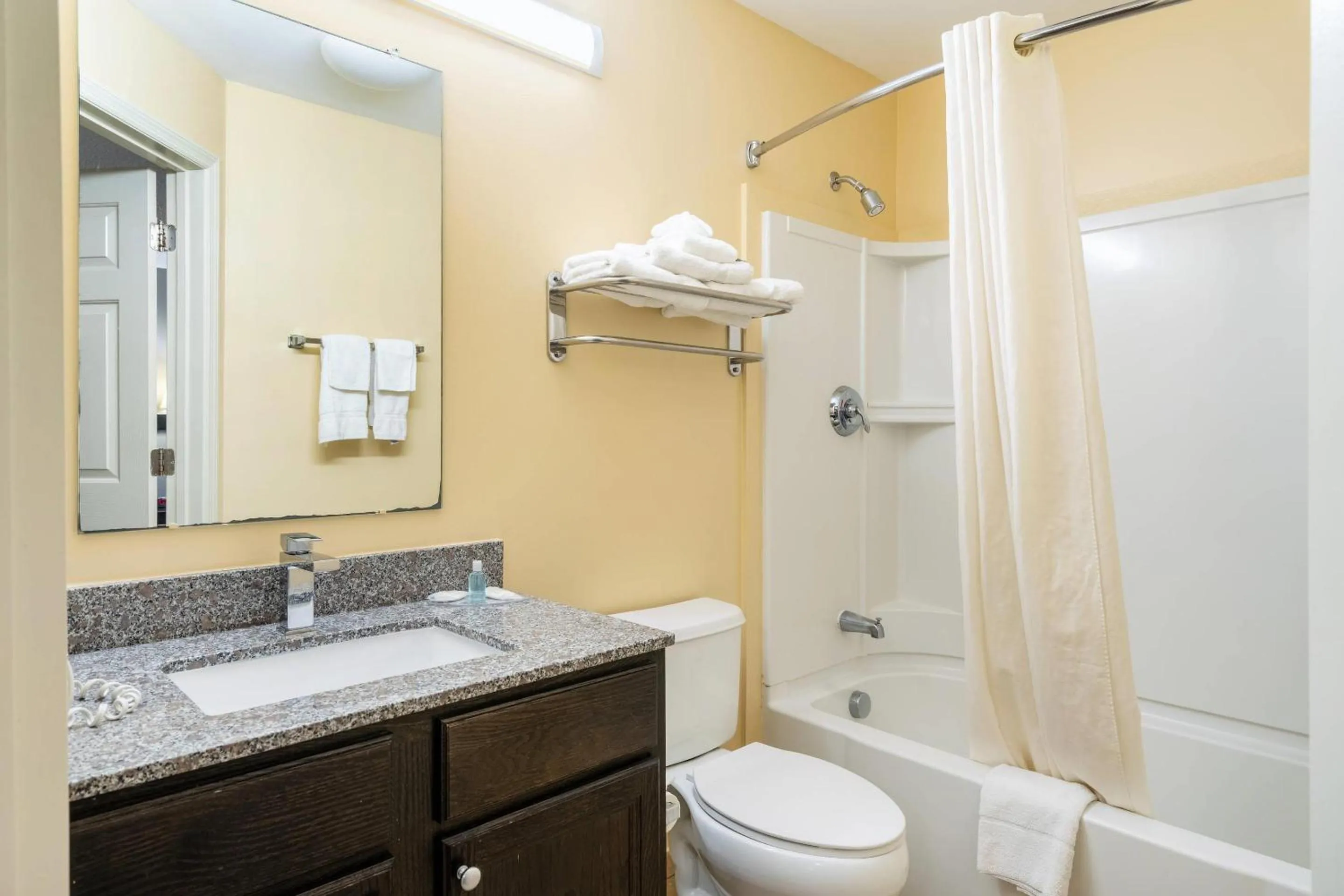 Bedroom in Suburban Studios Near Camp Lejeune