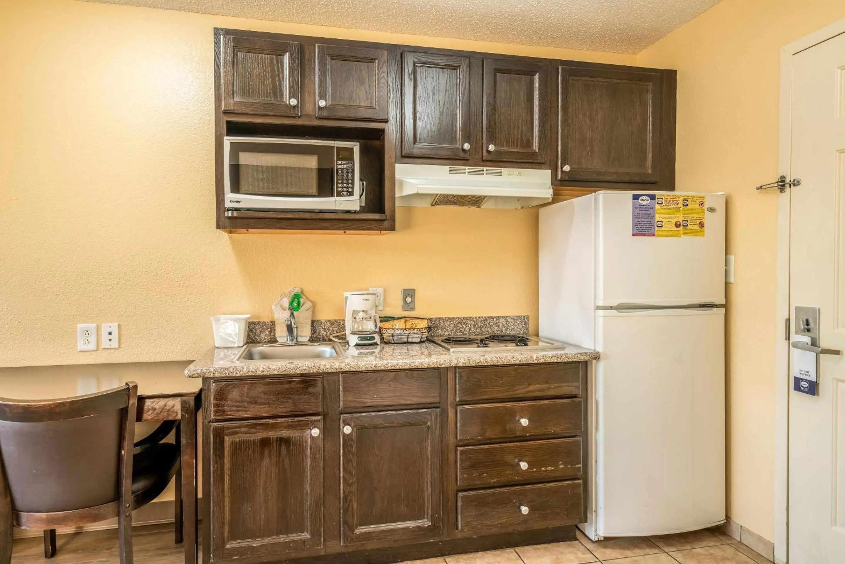 Bedroom in Suburban Studios Near Camp Lejeune