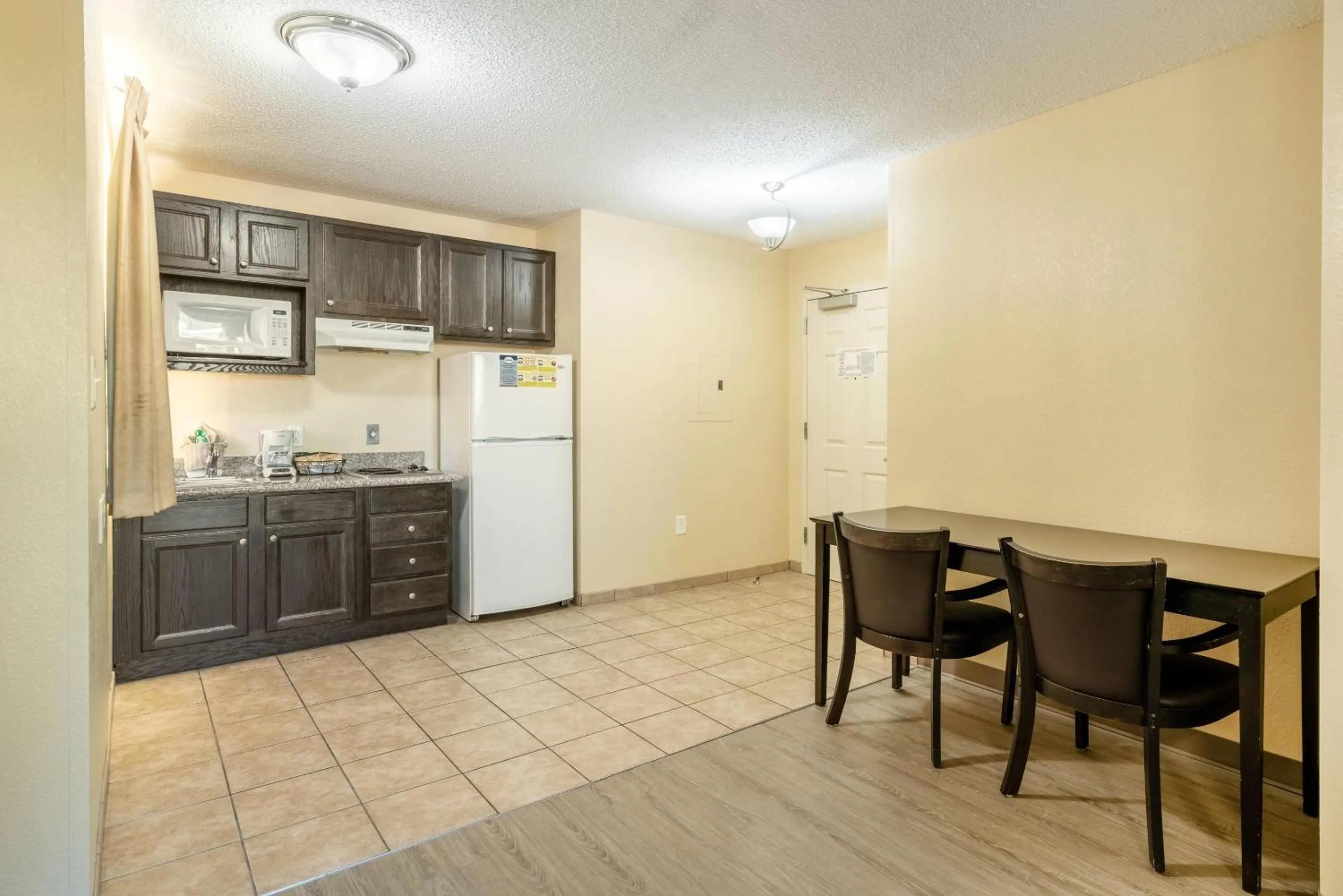 Bedroom in Suburban Studios Near Camp Lejeune
