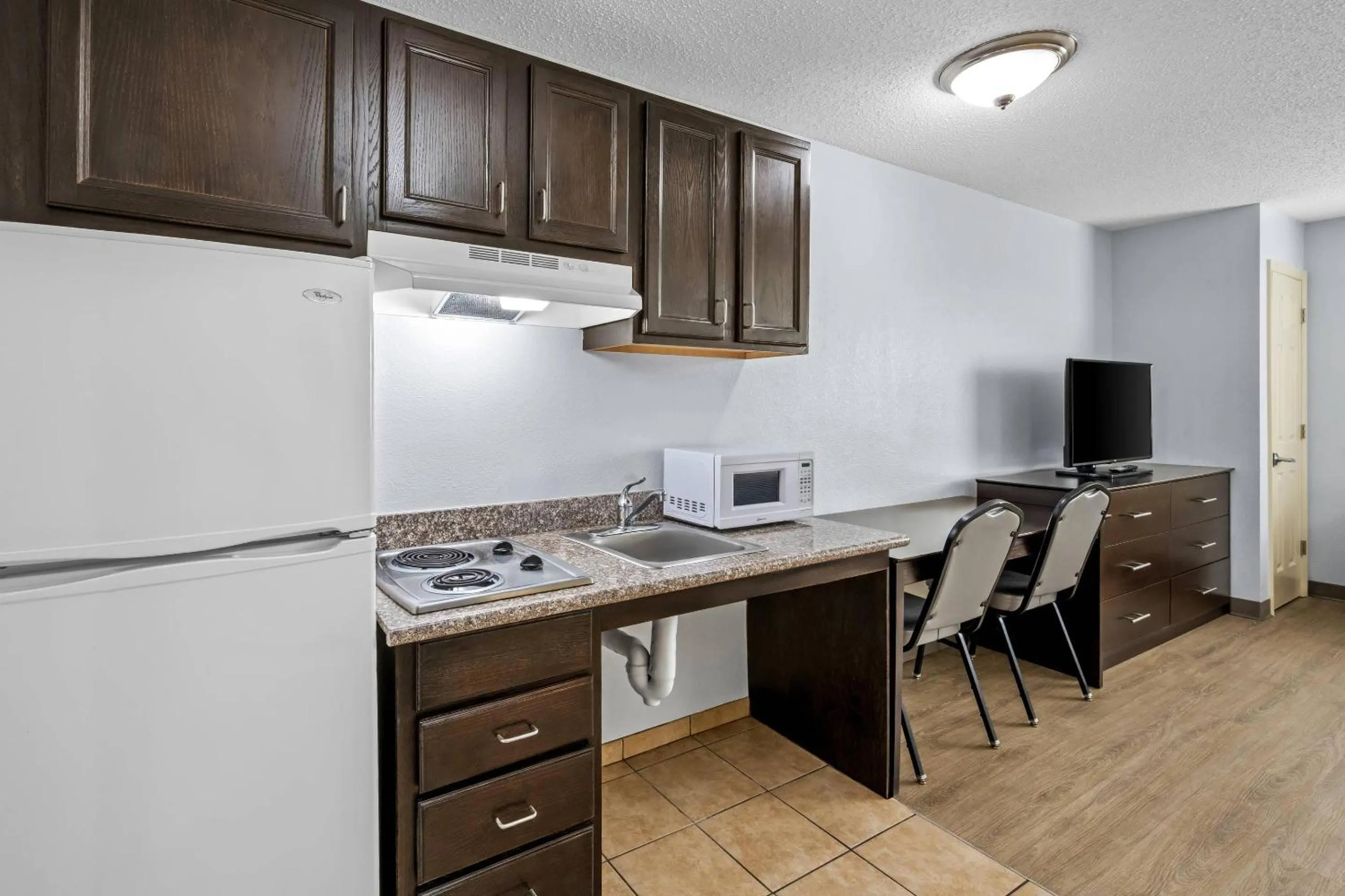 Bedroom in Suburban Studios Near Camp Lejeune