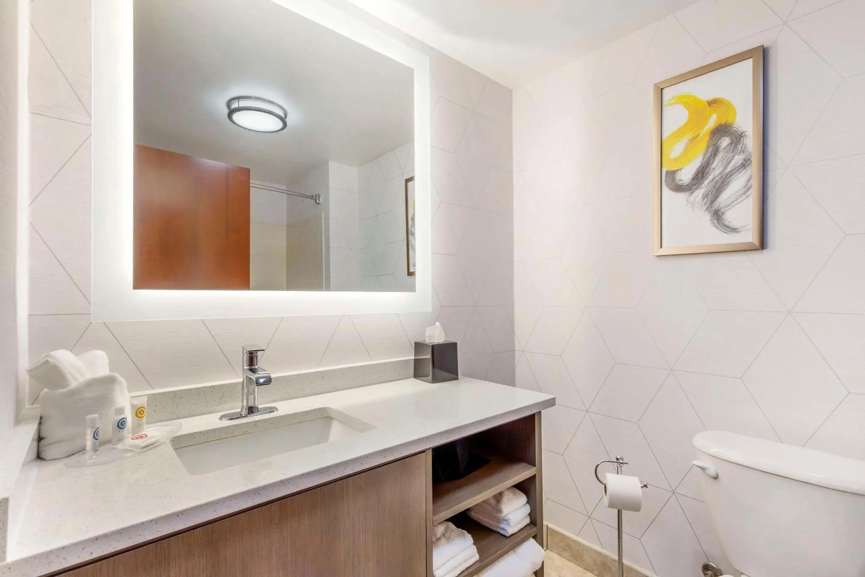 Bedroom in Comfort Suites Whitsett - Greensboro East Bedroom in Comfort Suites Whitsett - Greensboro East